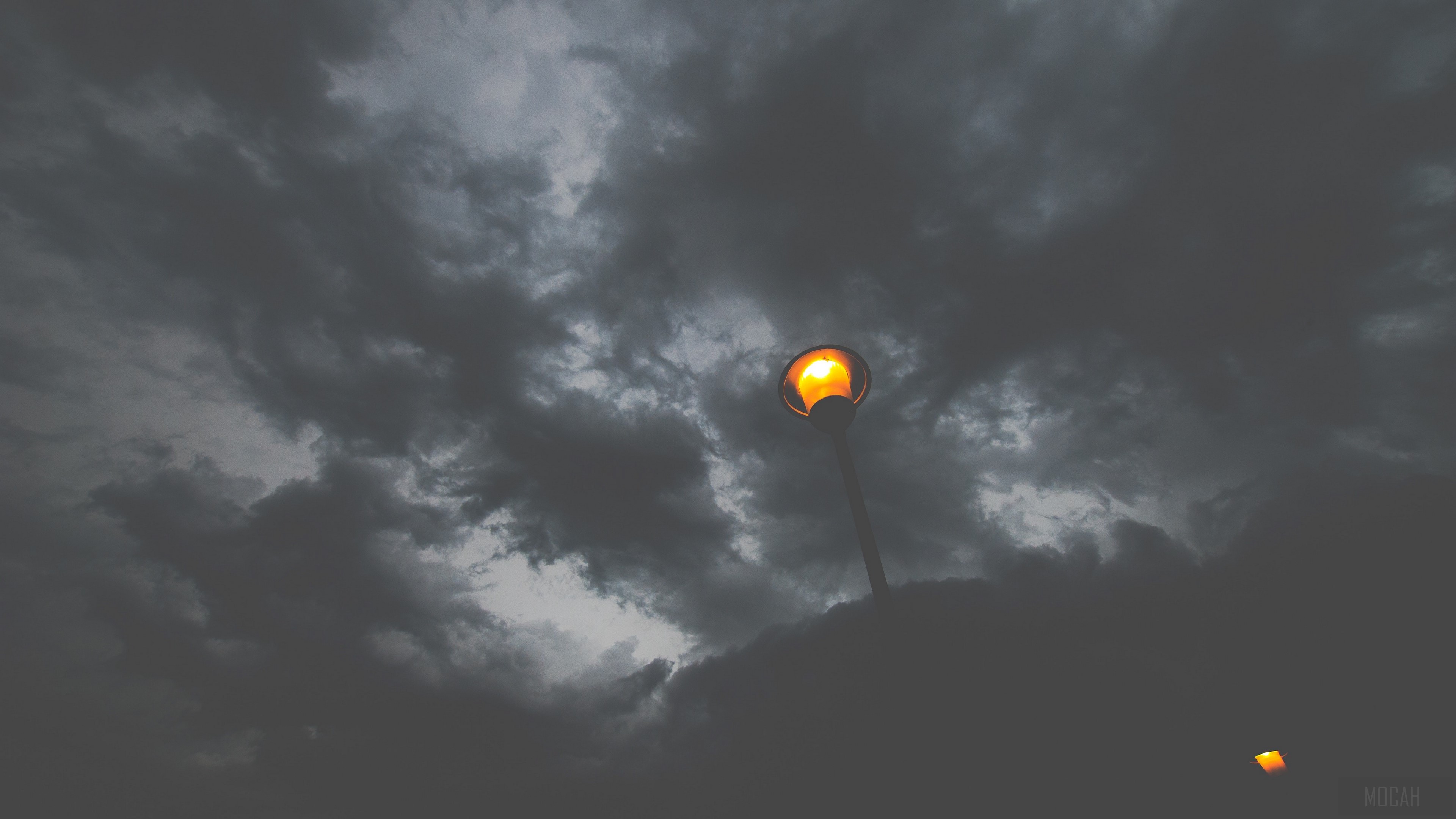 Street lamp and lantern against dark clouds 4K HD Wallpaper