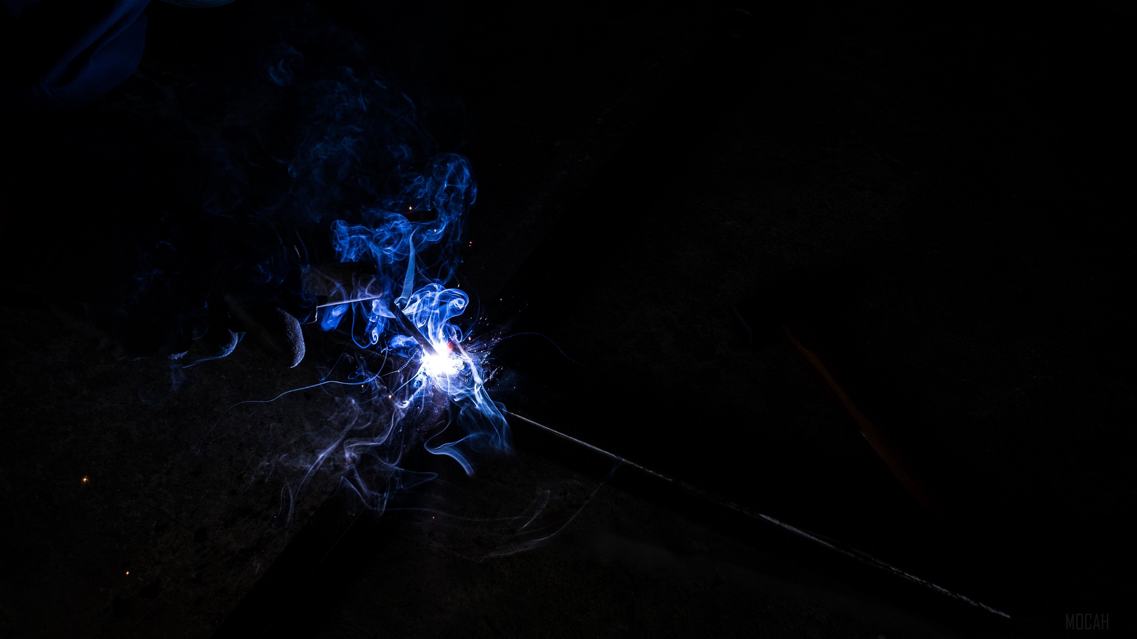 Welding sparks and smoke 4K HD Wallpaper