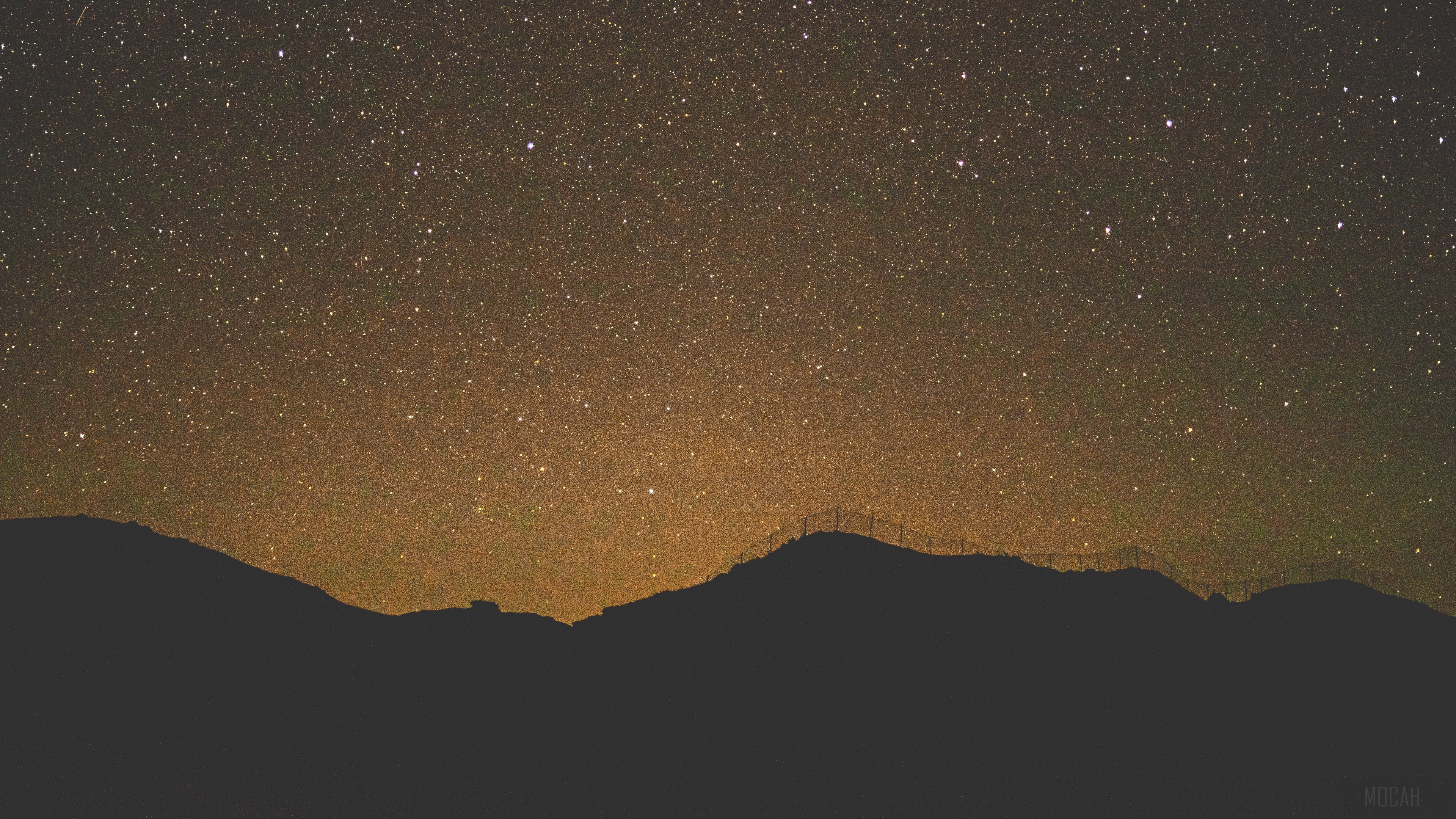 Starry night sky over mountains with fence HD Wallpaper