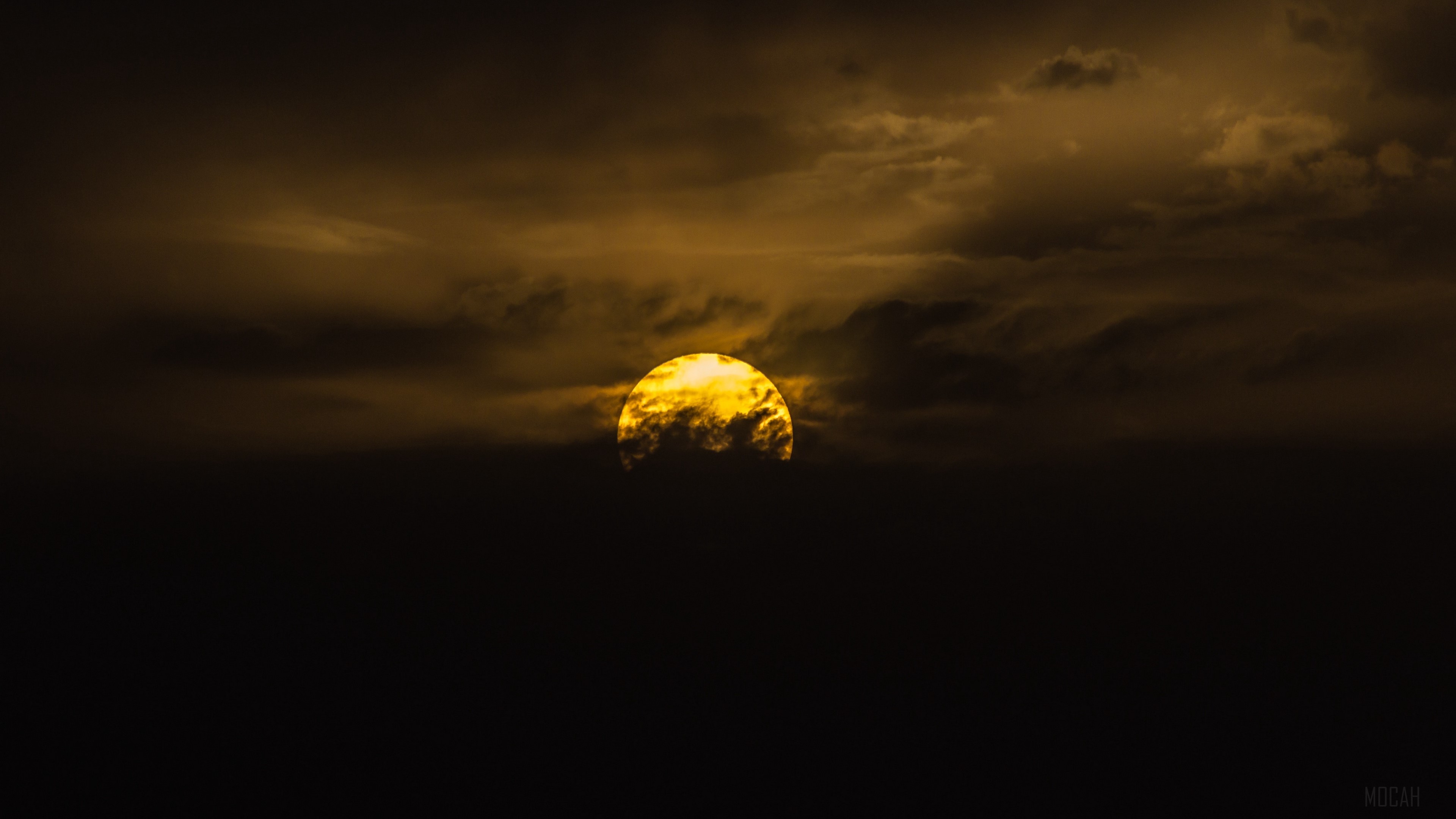 Sunset behind clouds 4K HD Wallpaper