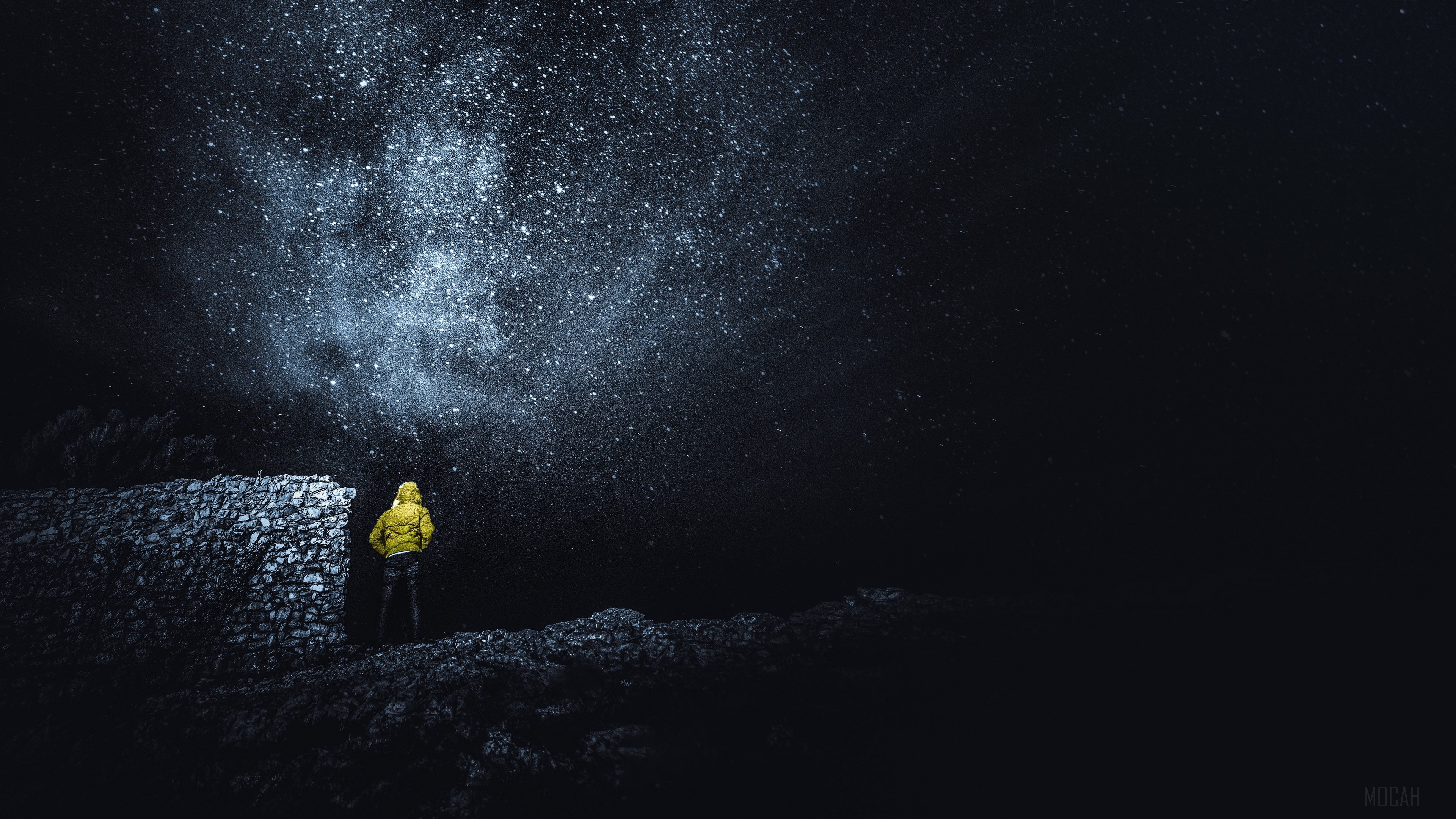 Man in yellow jacket looking at starry sky HD Wallpaper