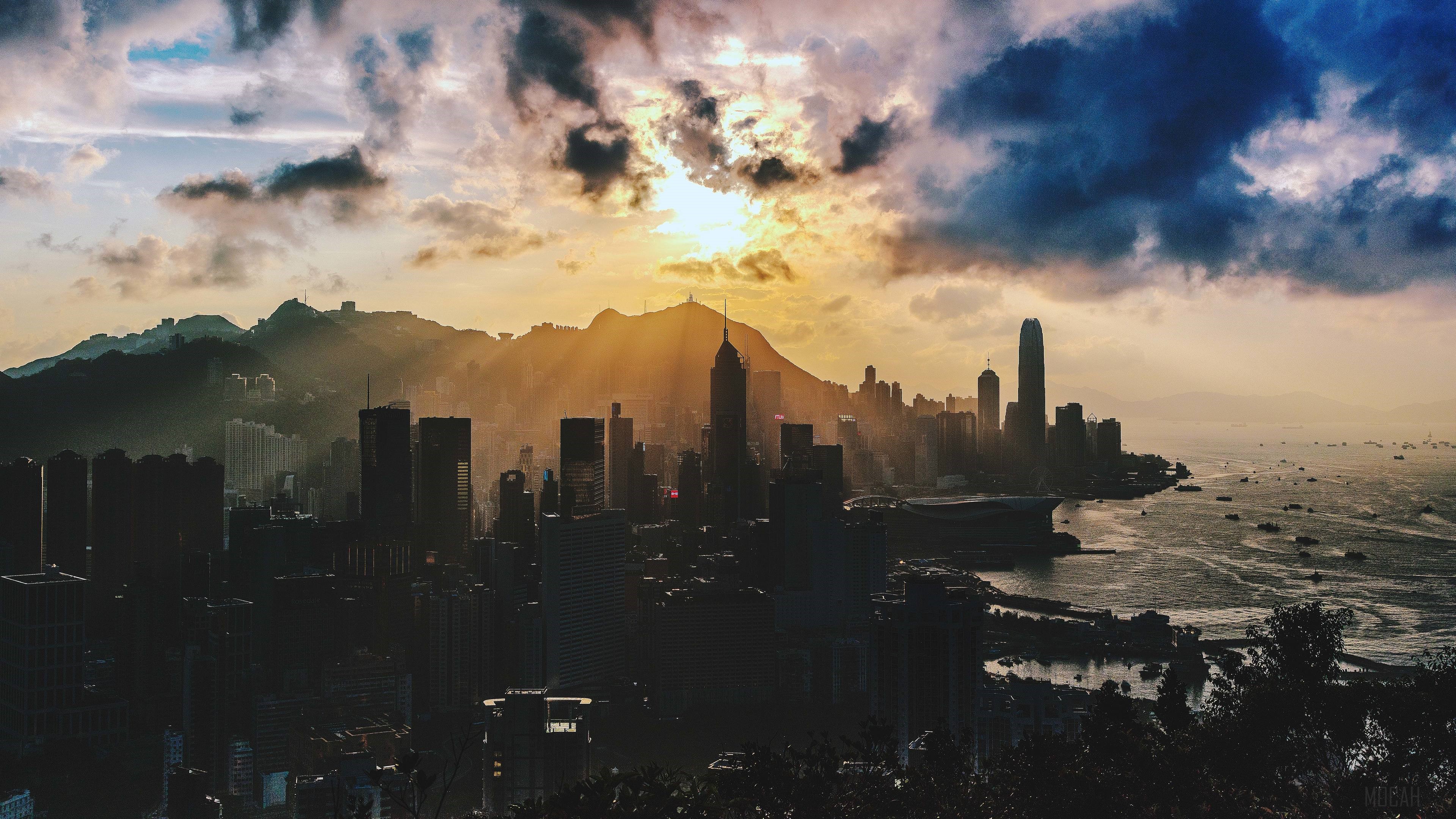Hong Kong Skyline at Sunset with Mountains and Ocean HD Wallpaper