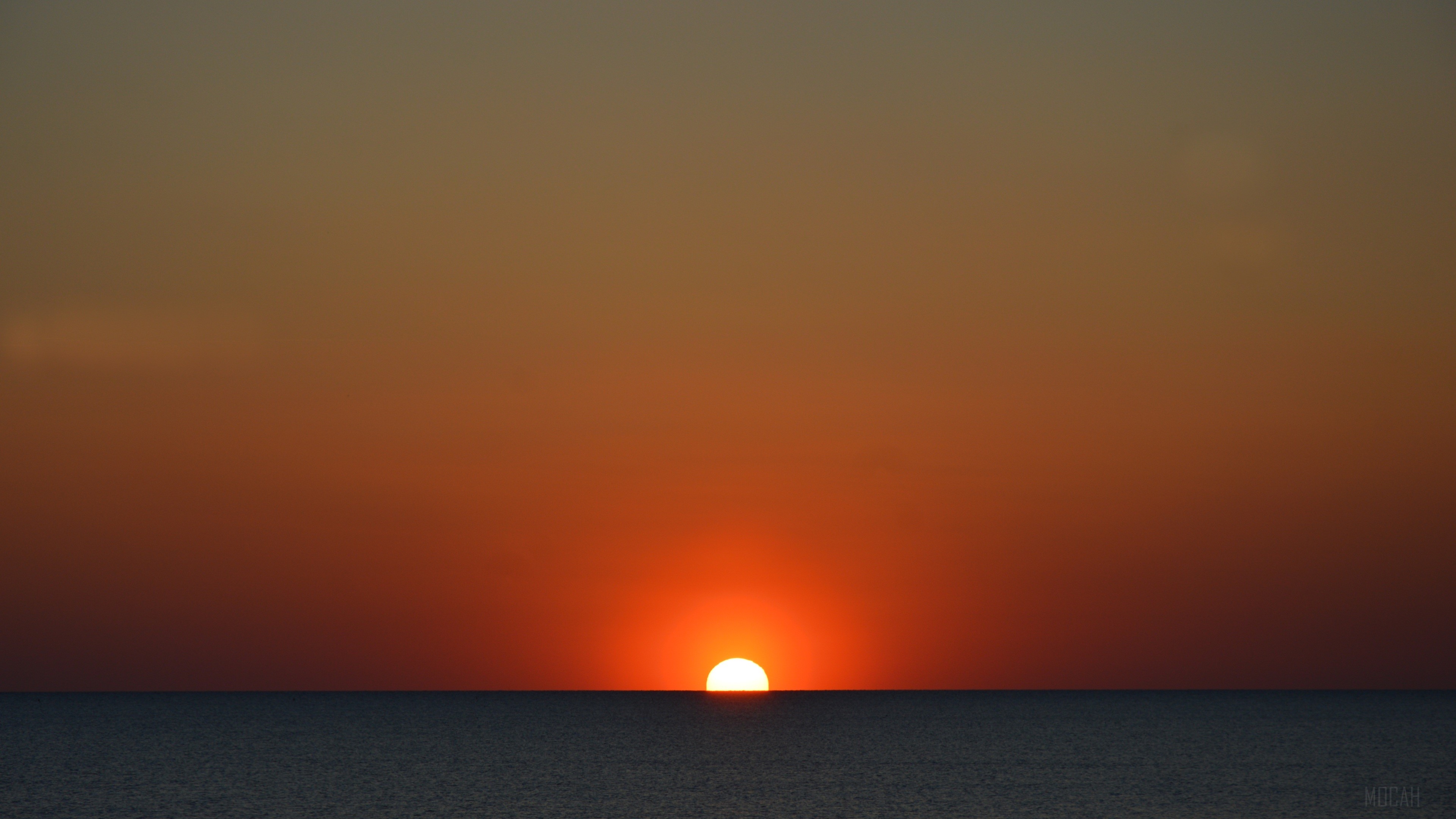 Sunset over the ocean 4K HD Wallpaper