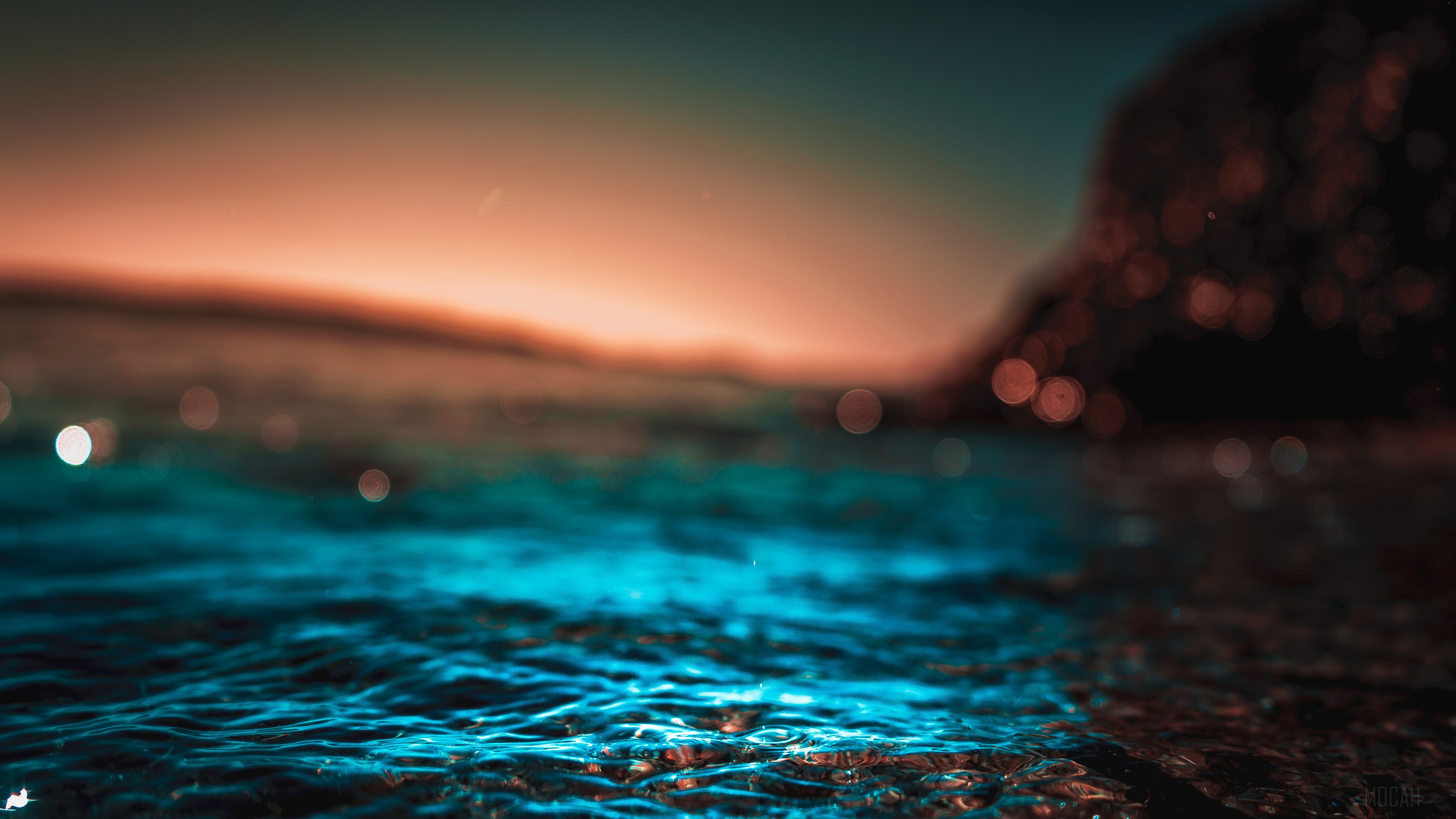 Ocean Water at Dusk with Bokeh Lights 4K HD Wallpaper