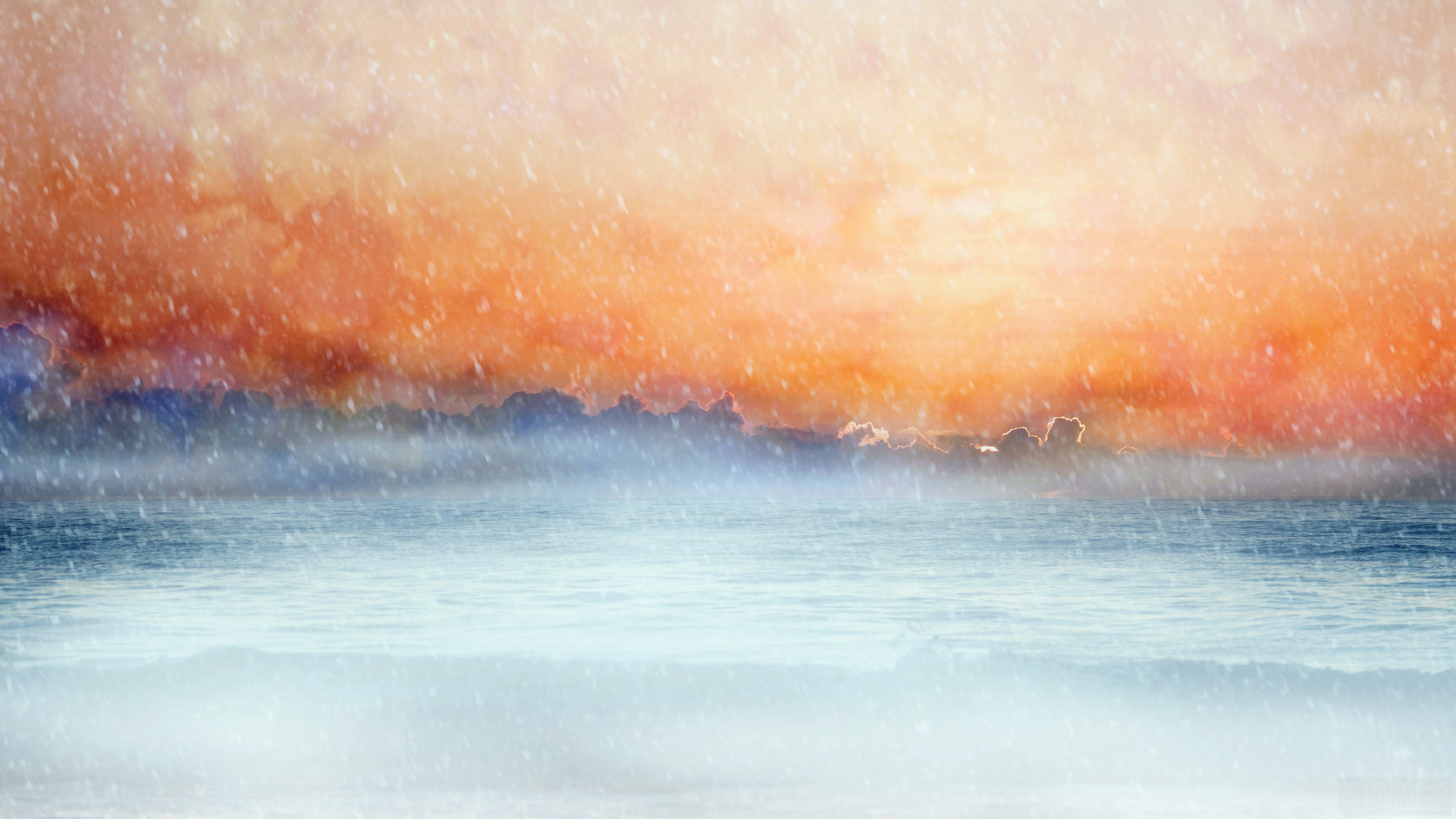 Ocean under orange clouds with falling snow HD Wallpaper
