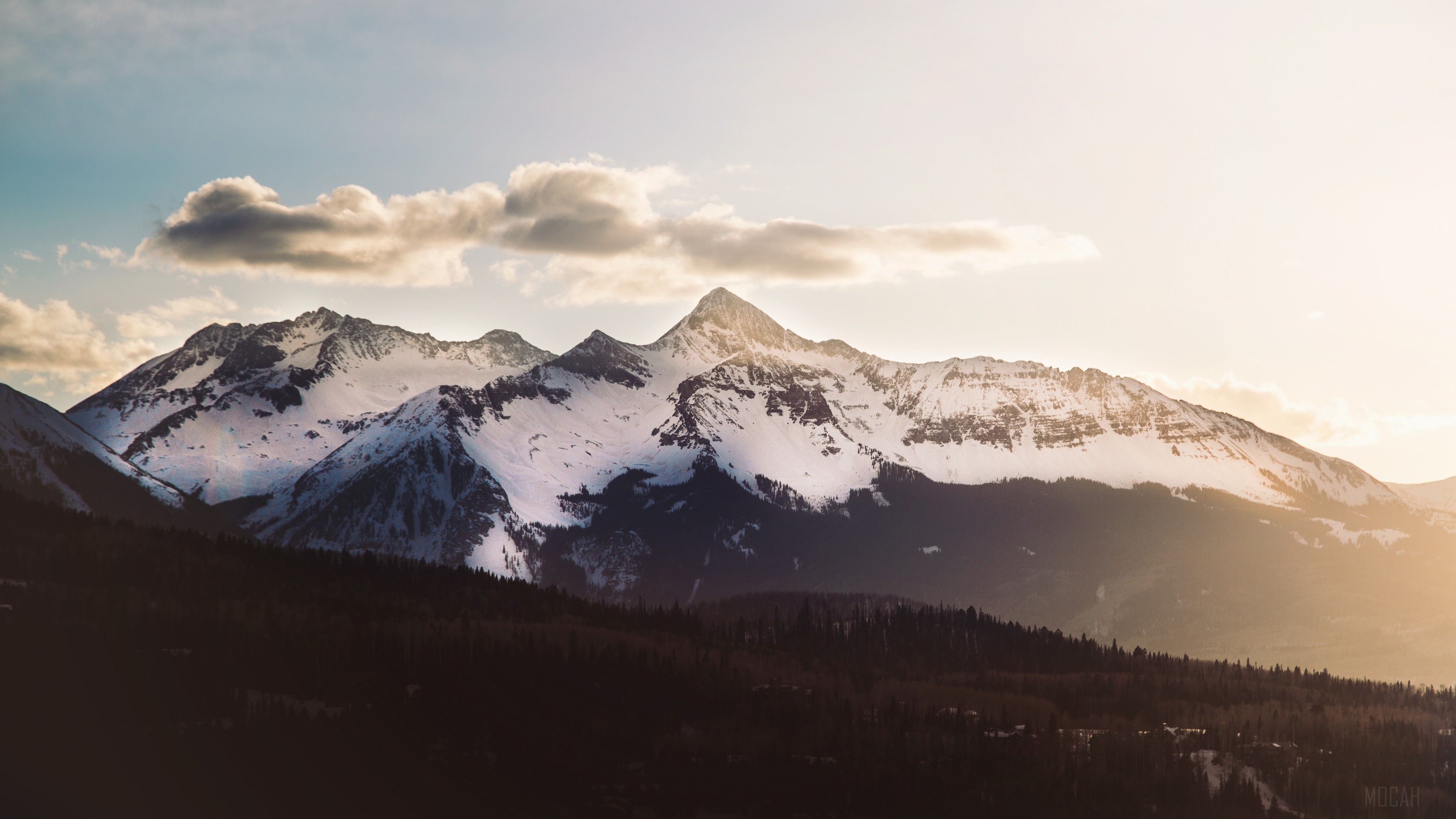 Snow-covered mountains with trees and clouds HD Wallpaper