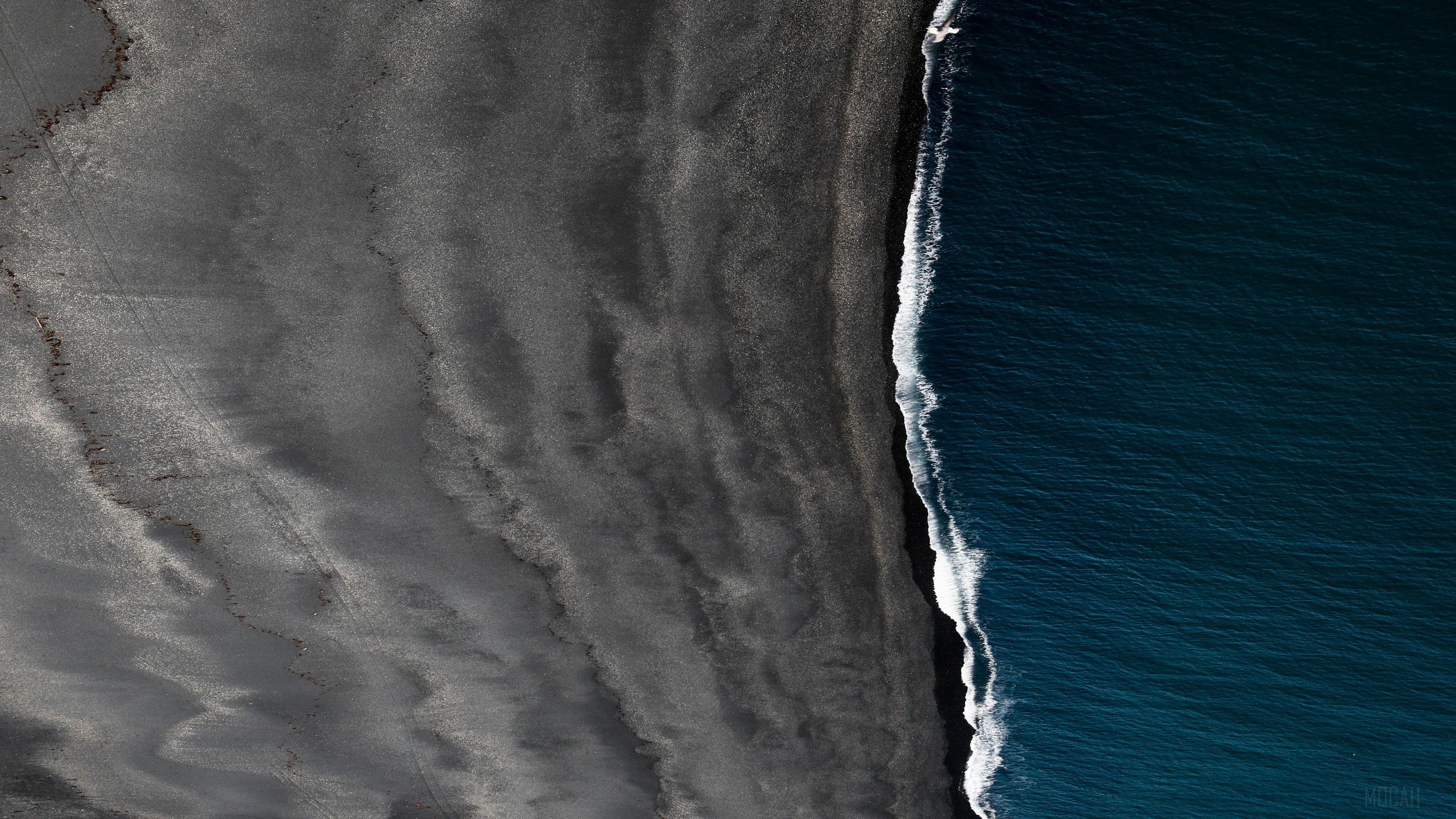 Black Sand Beach and Ocean Waves in Iceland 4K HD Wallpaper