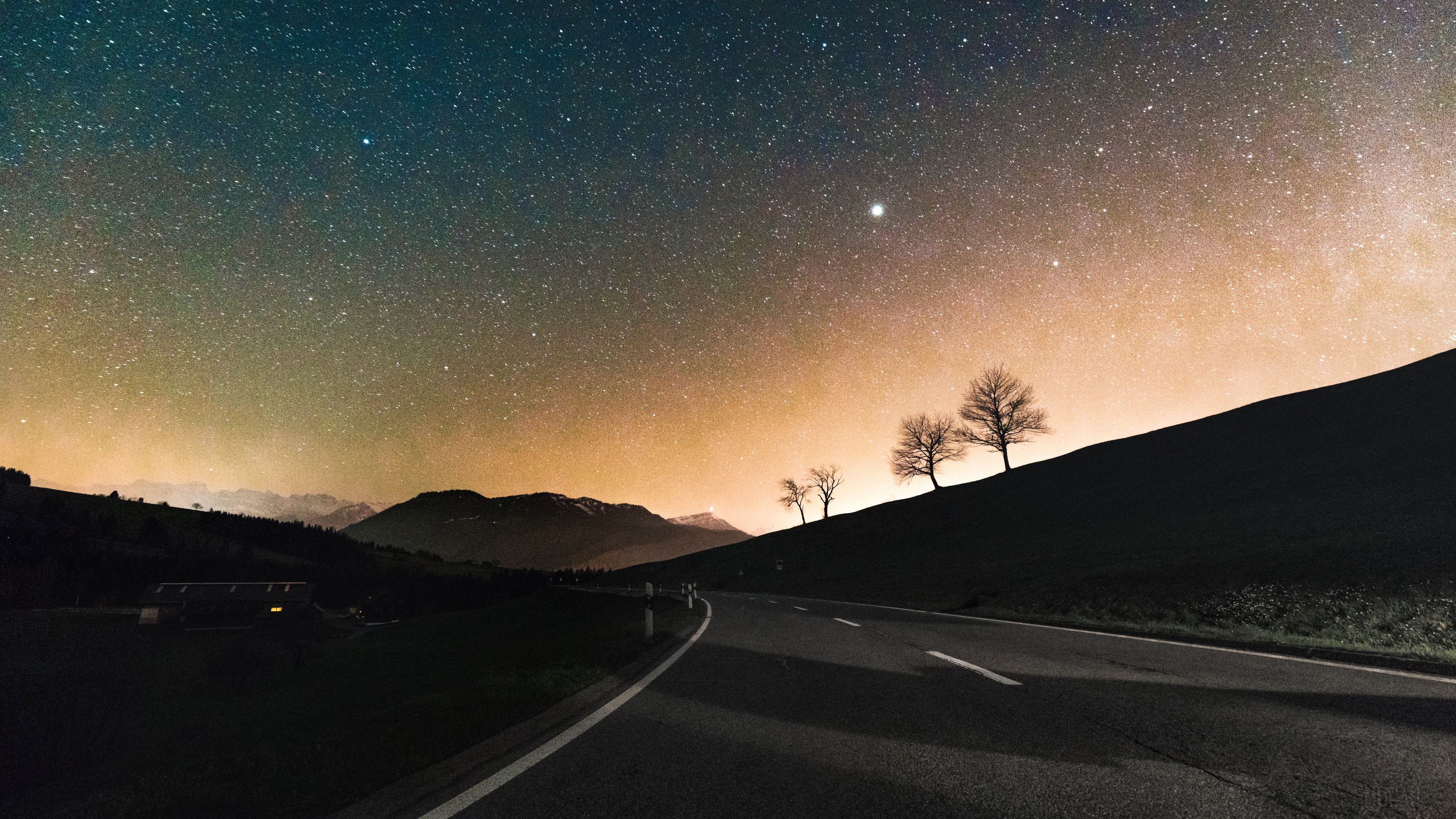 Road under a sky full of stars HD Wallpaper