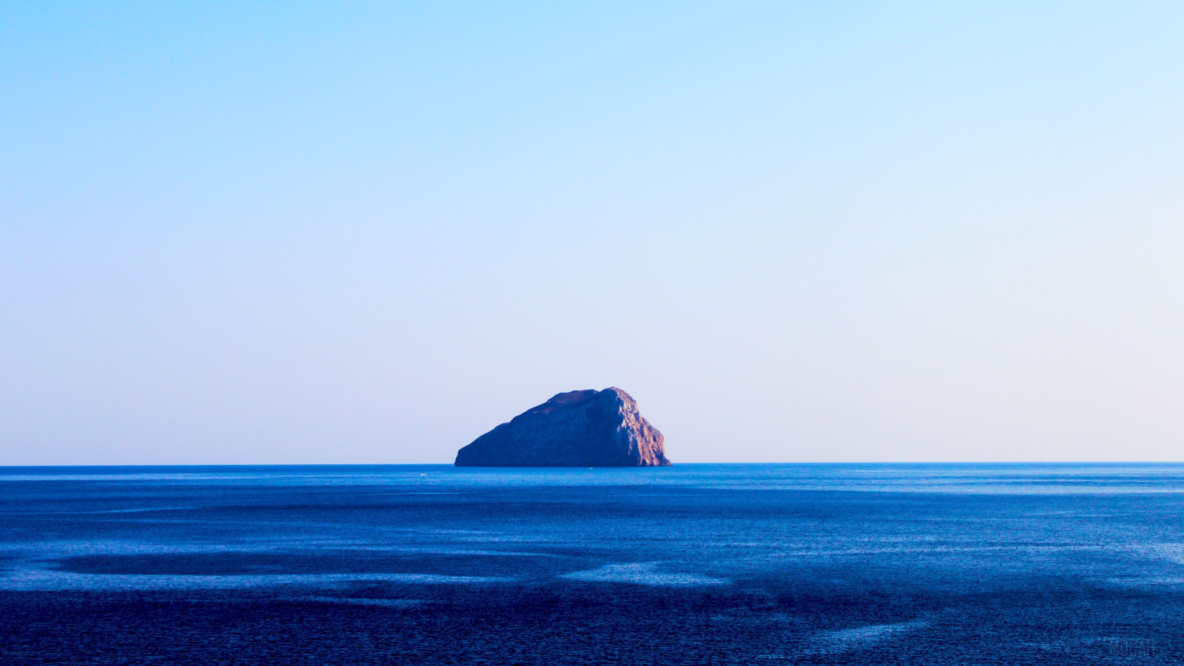 Island Rock in the Ocean 4K HD Wallpaper
