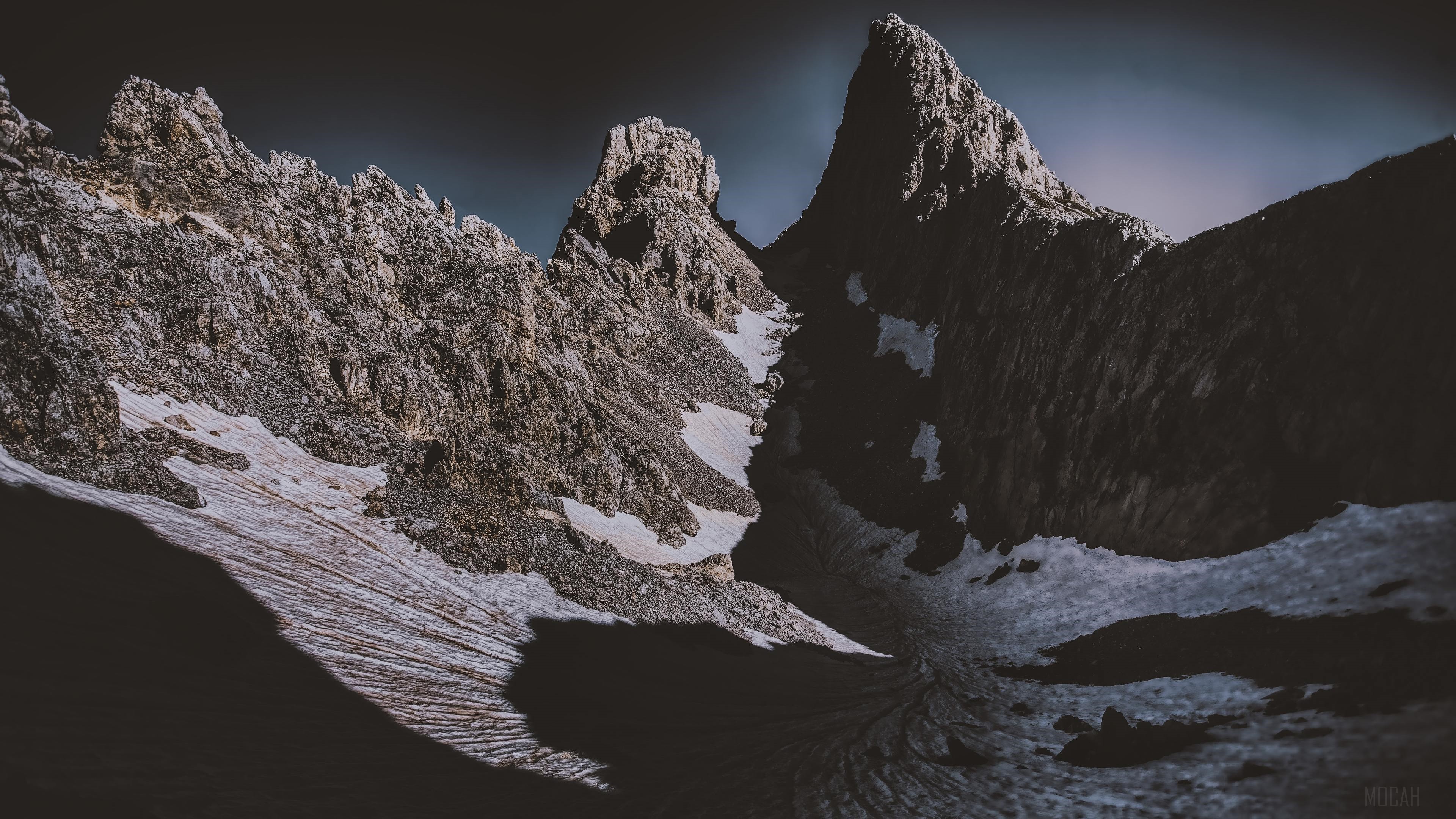 Dark Mountains Covered By Snow HD Wallpaper