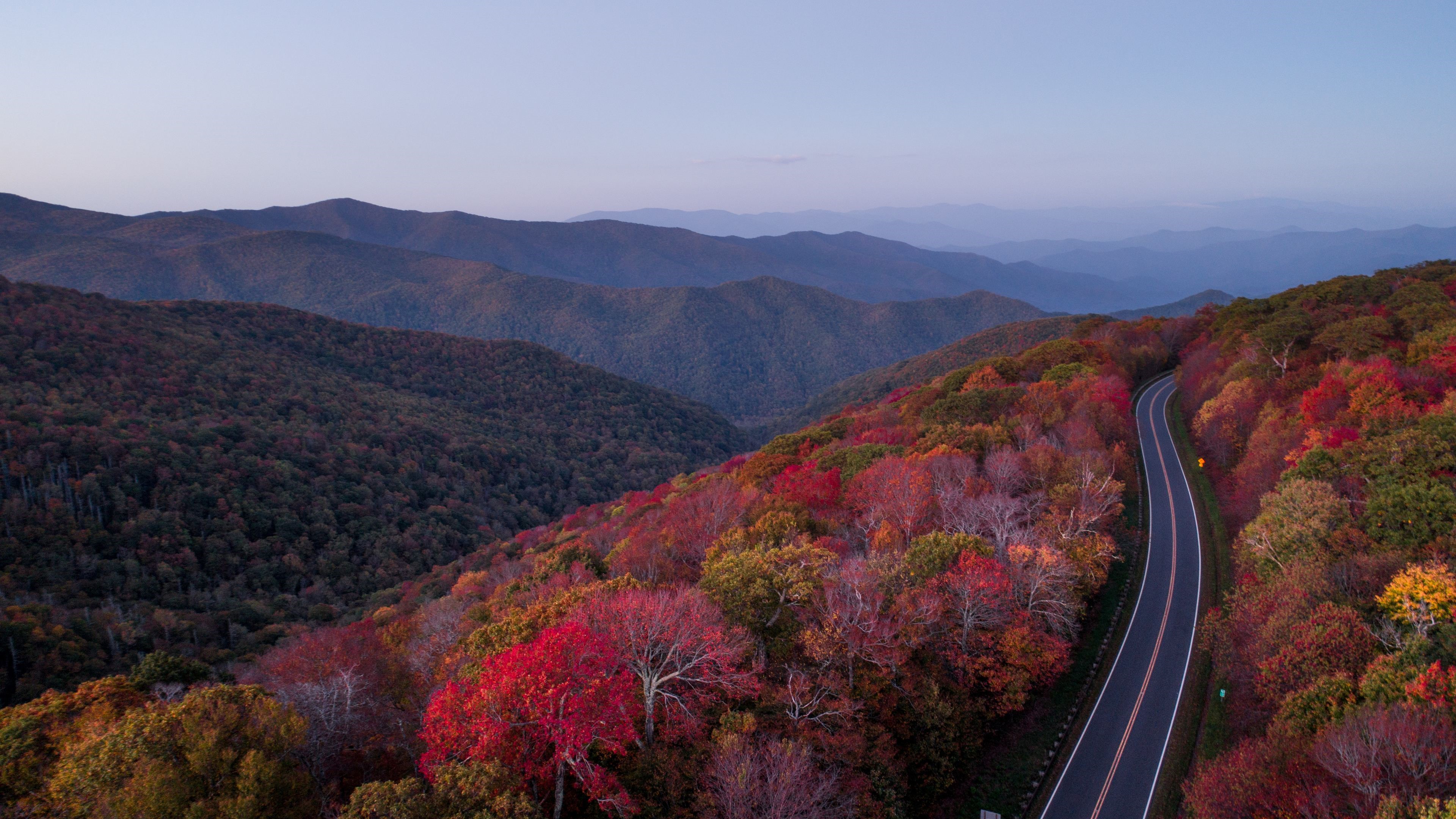 Road Through Autumn Forest and Mountains 4K HD Wallpaper