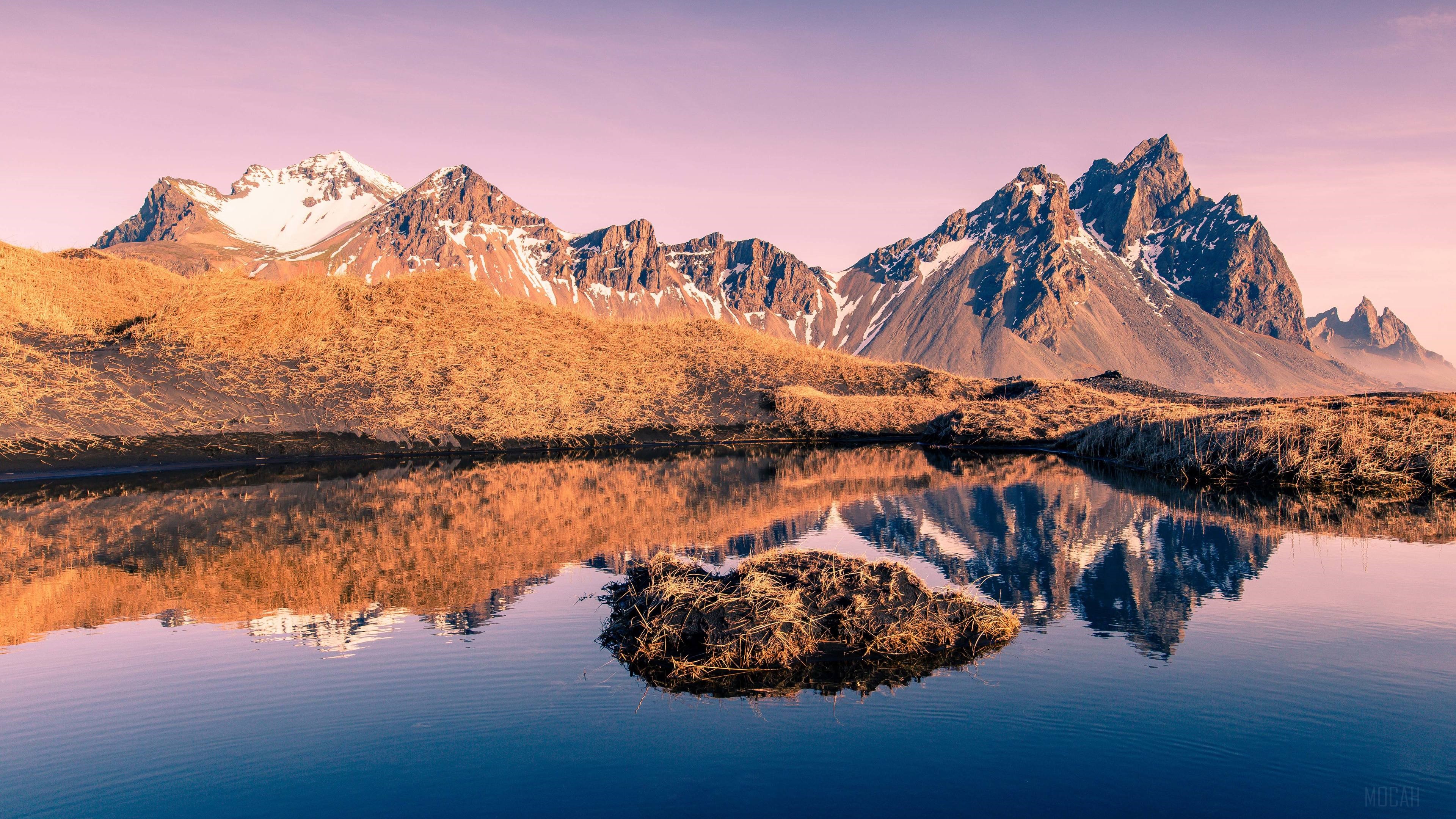 Mountains reflected in a lake at sunset 4K HD Wallpaper