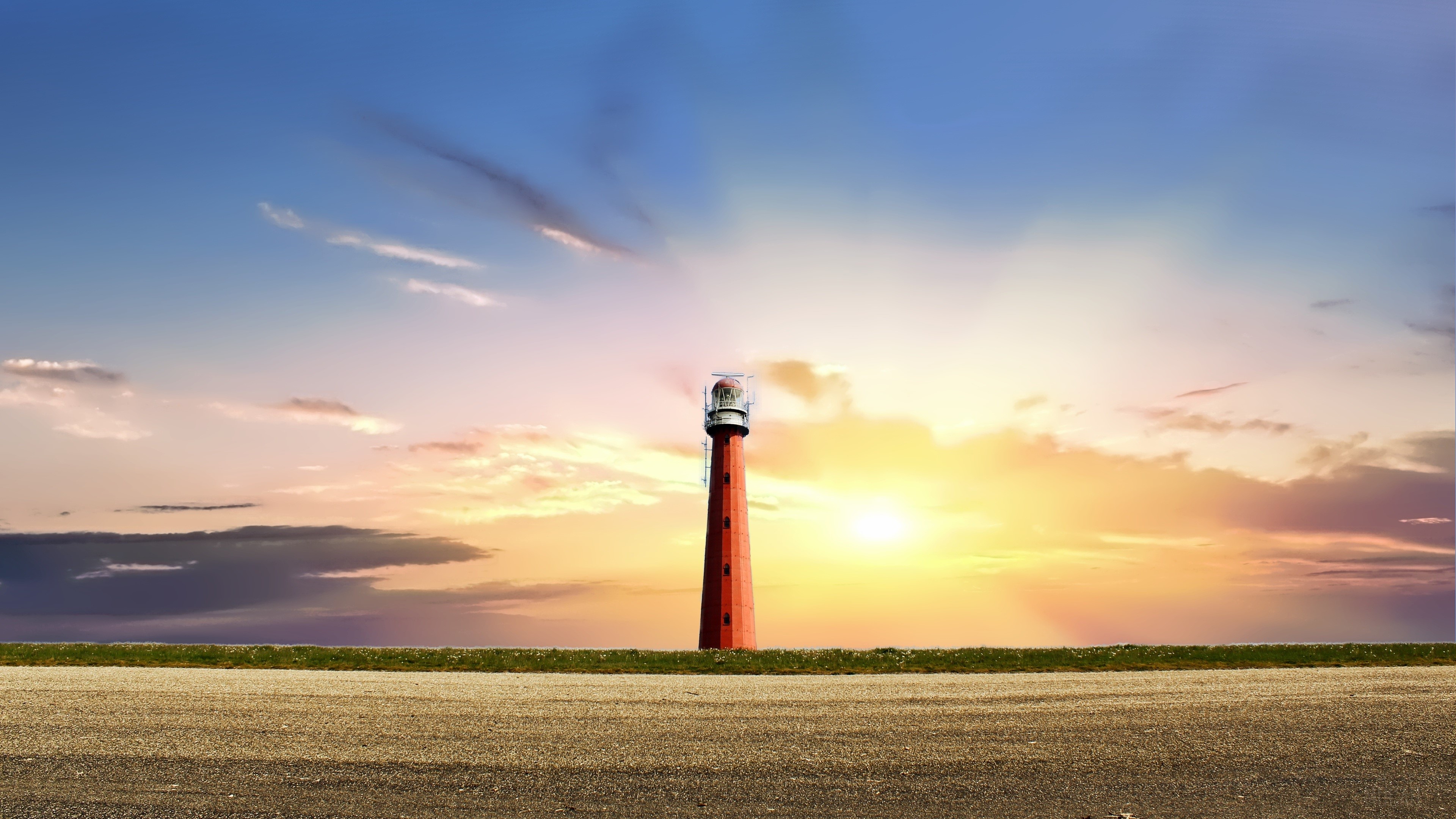 Lighthouse at Sunset with Dramatic Sky HD Wallpaper
