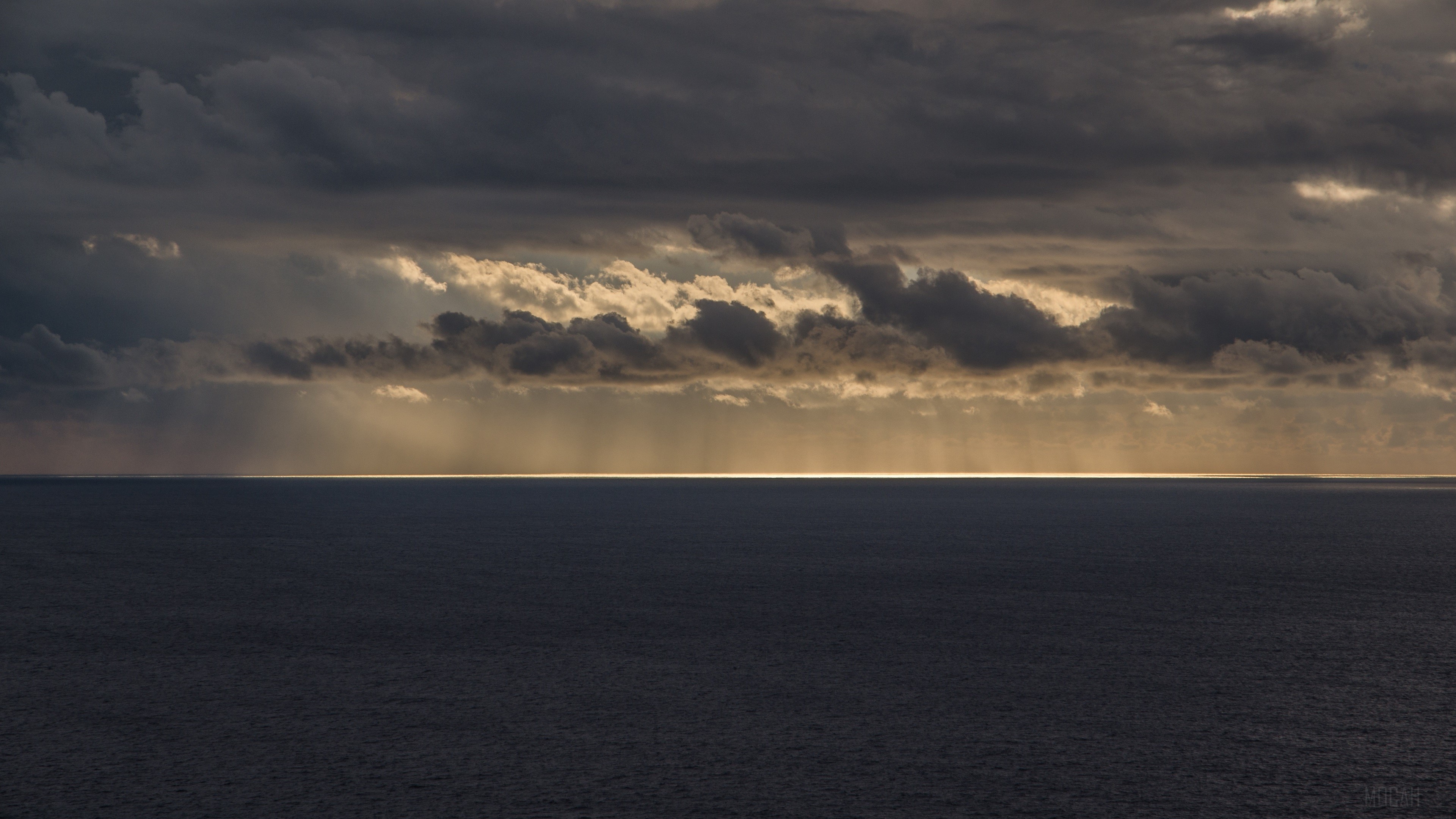 Sea and Sunlight through Clouds 4K HD Wallpaper