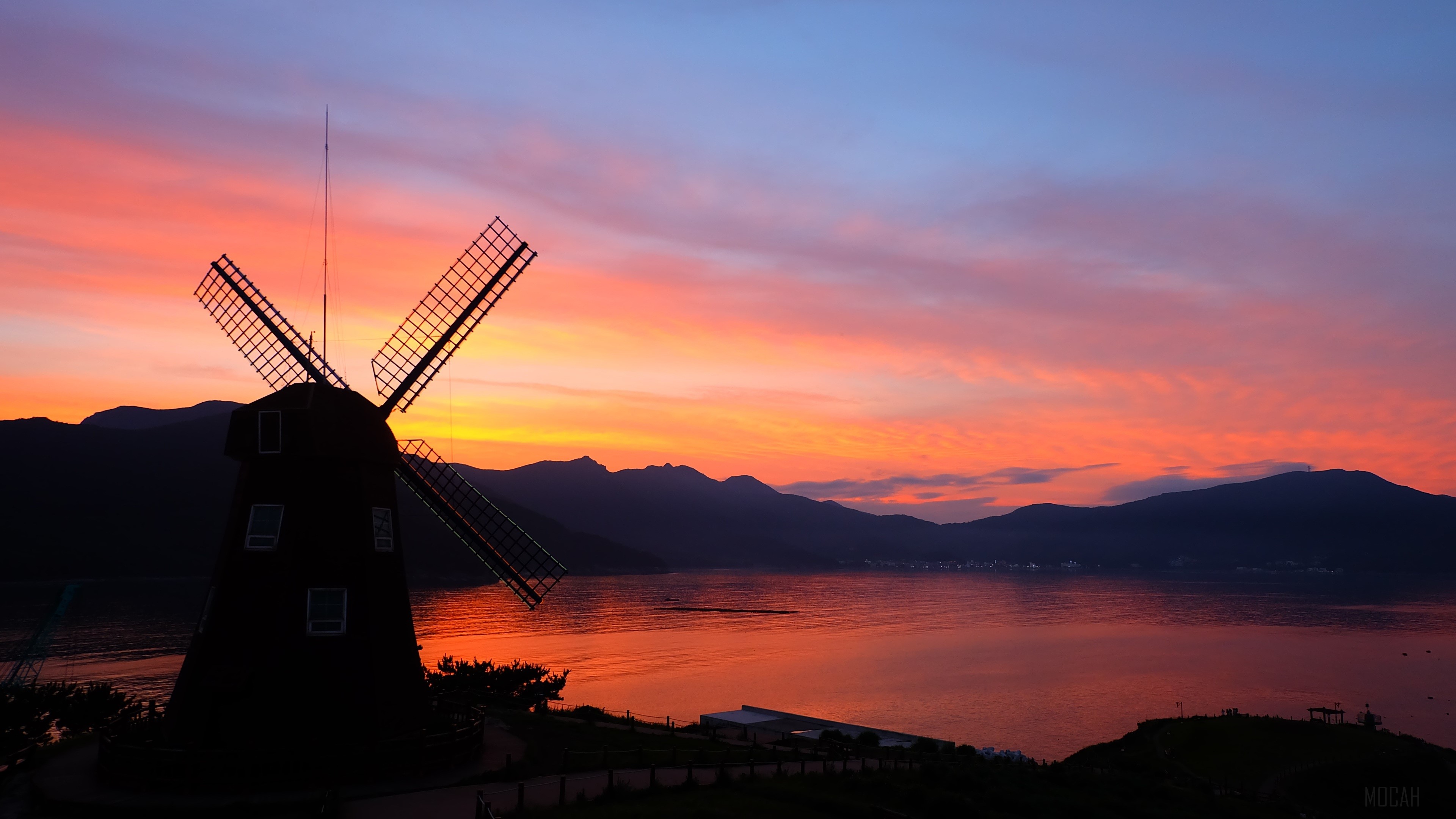 Silhouette of a windmill at sunset HD Wallpaper