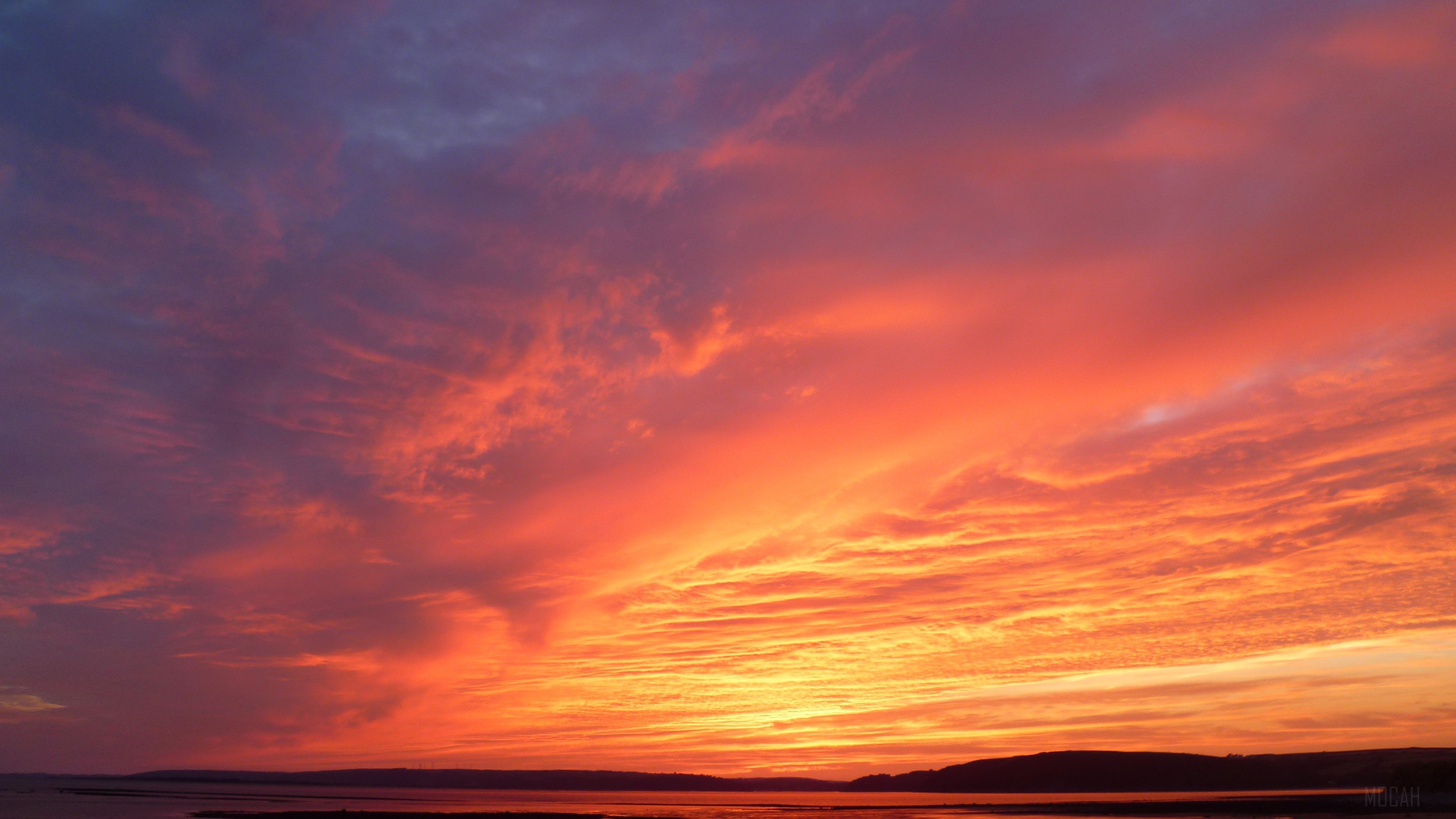 Sunset over a landscape shore 4K HD Wallpaper
