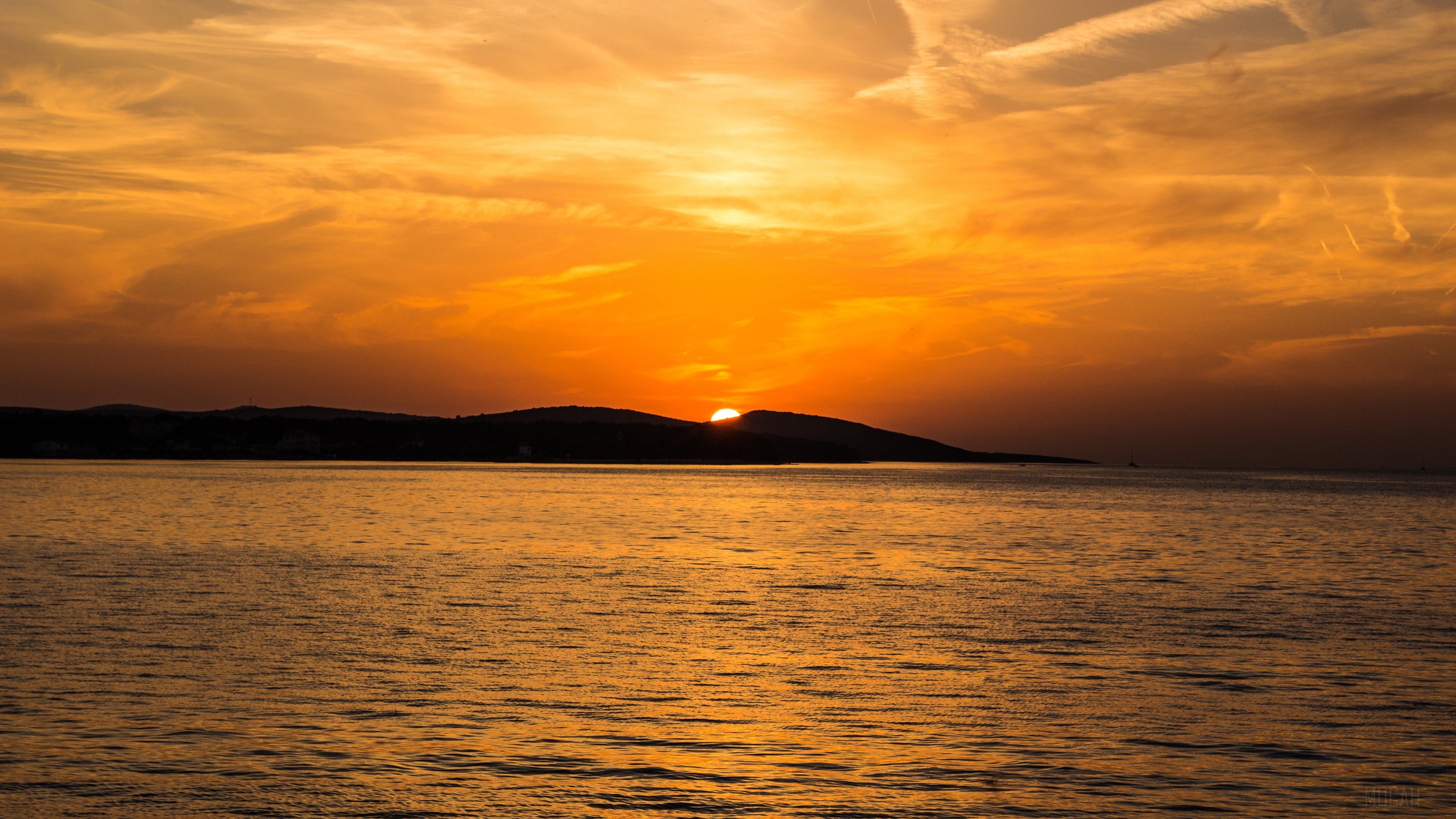 Sunset over the sea with island mountains 4K HD Wallpaper