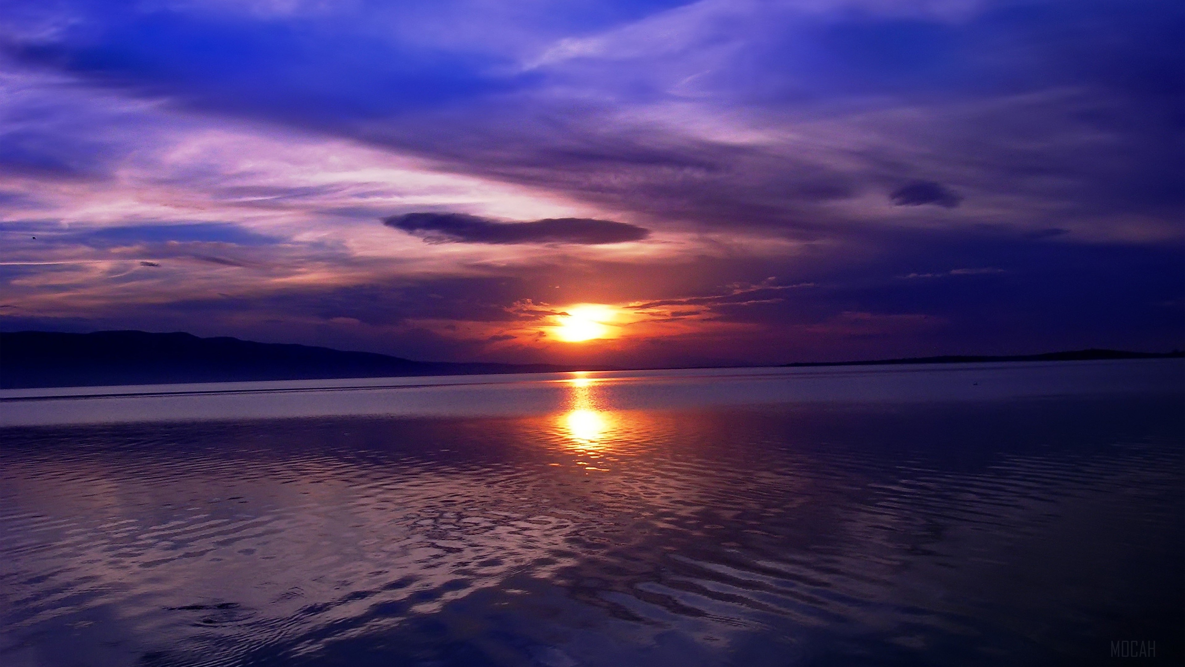 Sunset over a lake with mountains HD Wallpaper