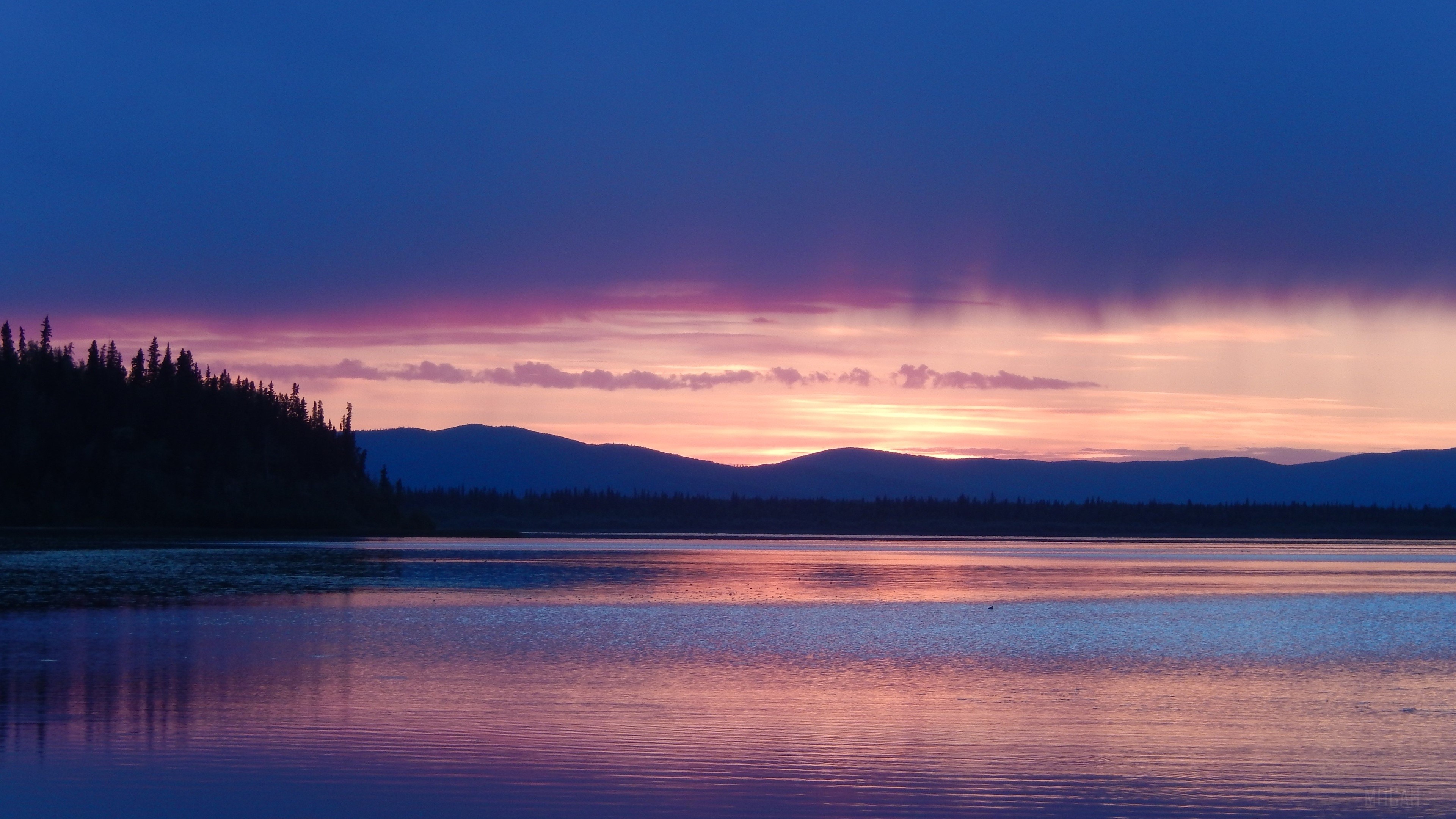 Sunset over a lake with mountains and forest HD Wallpaper