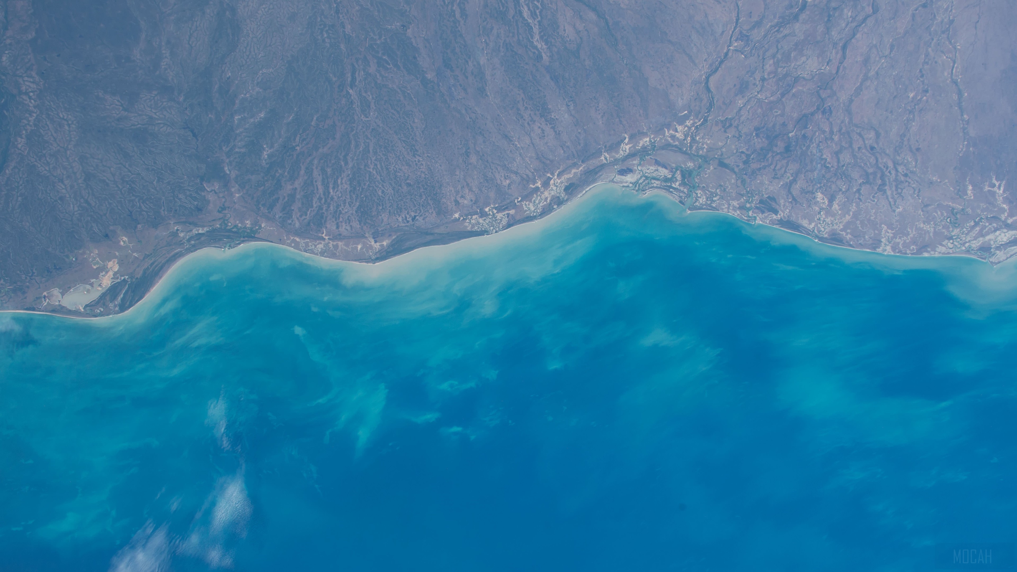 Earth from space showing coastline and ocean HD Wallpaper