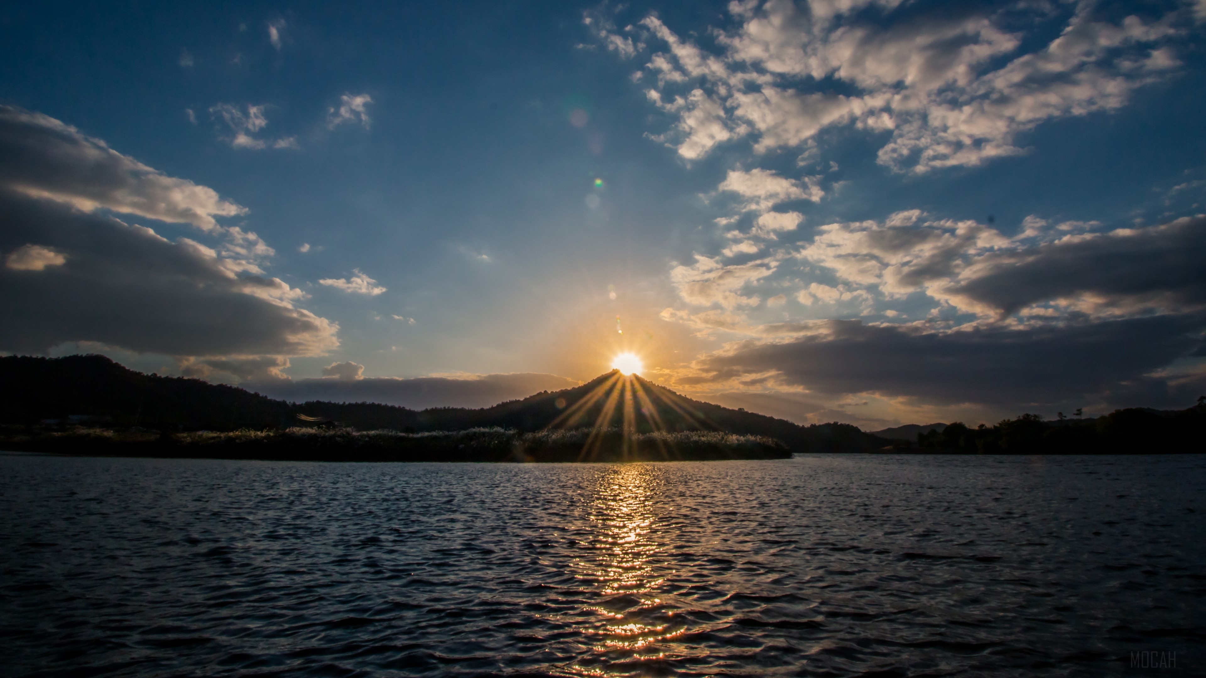 Sunset over a lake with mountains HD Wallpaper