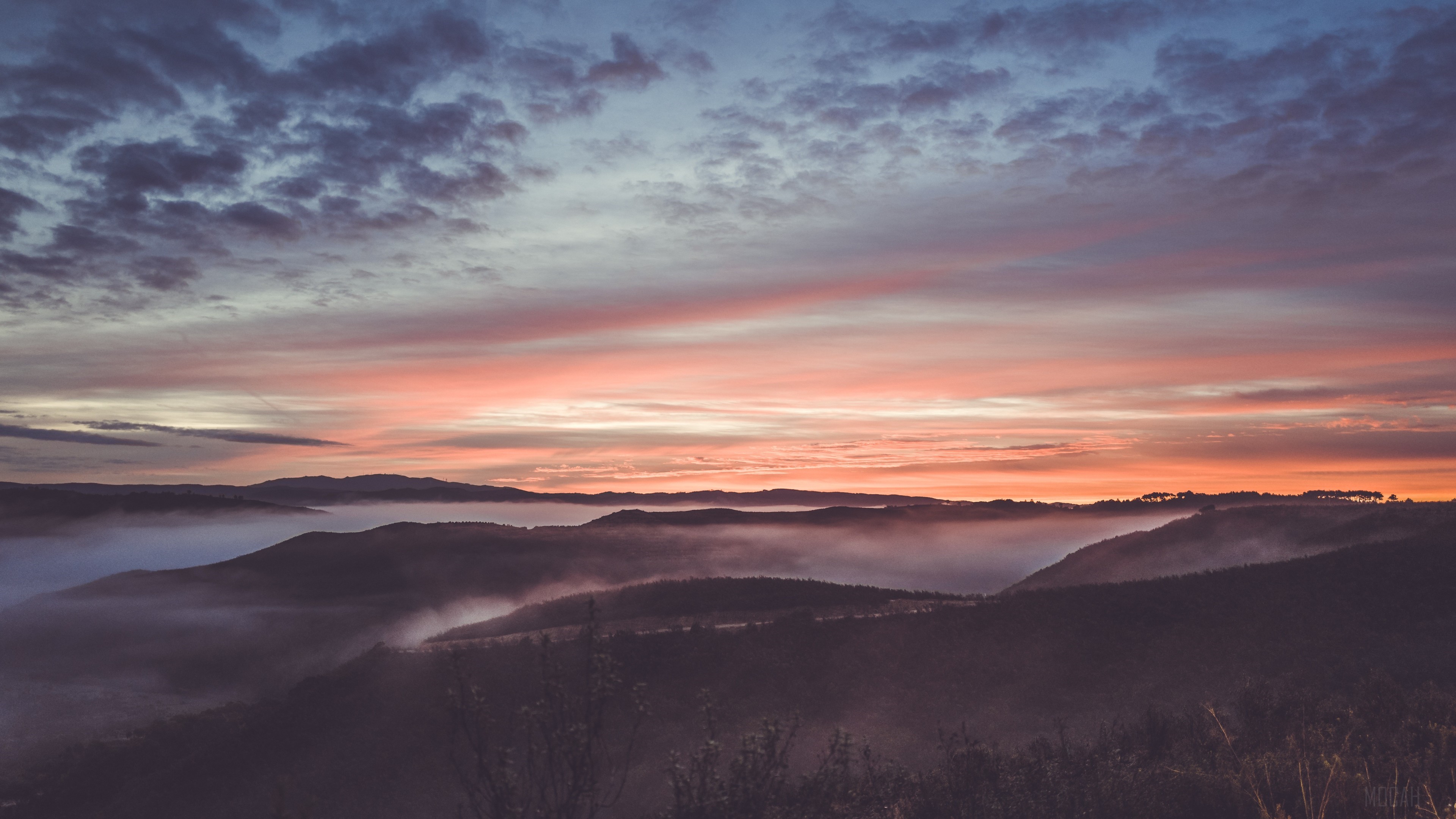 Sunrise over misty mountains with colorful sky HD Wallpaper