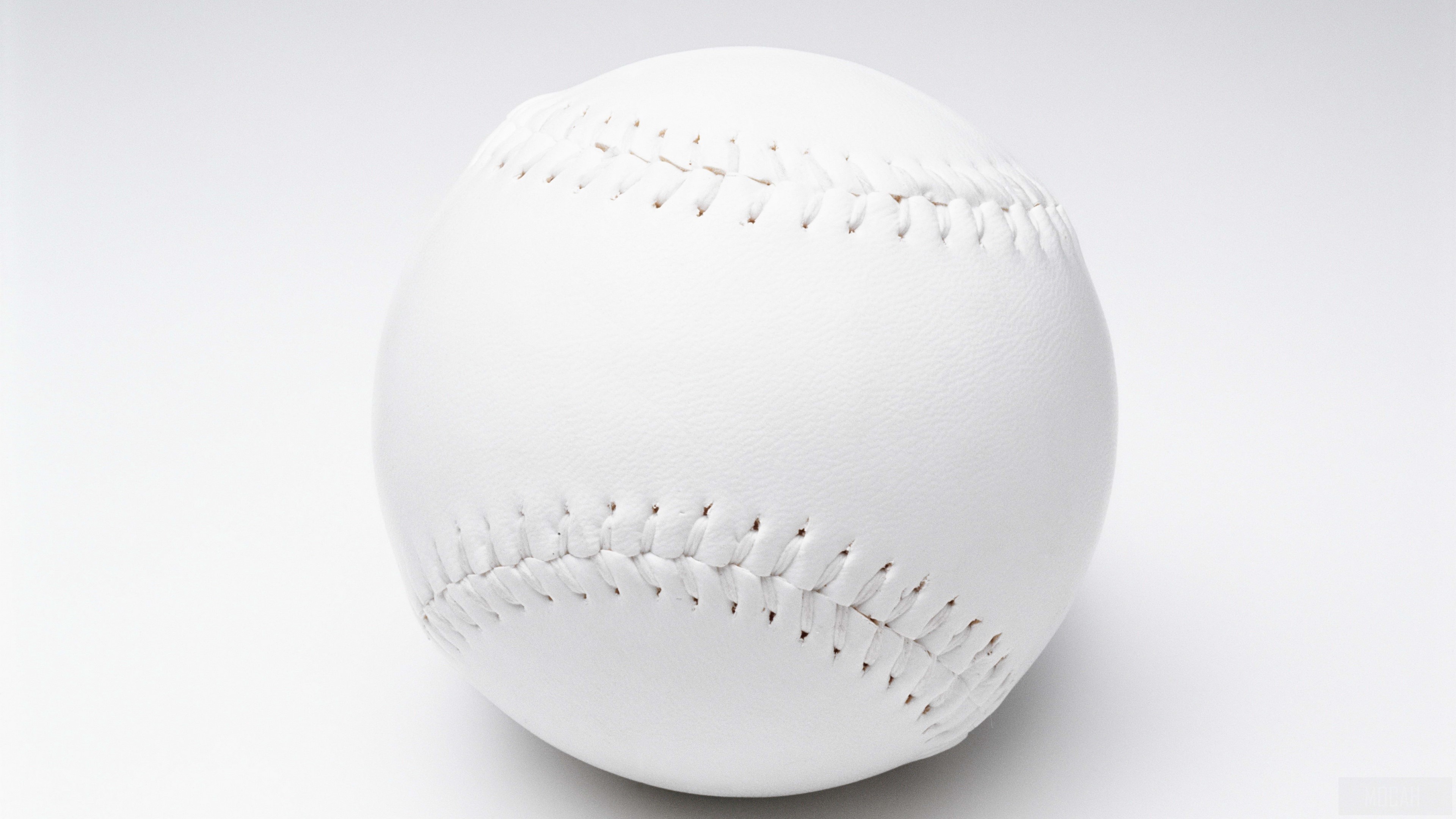 White baseball on a white background 4K HD Wallpaper