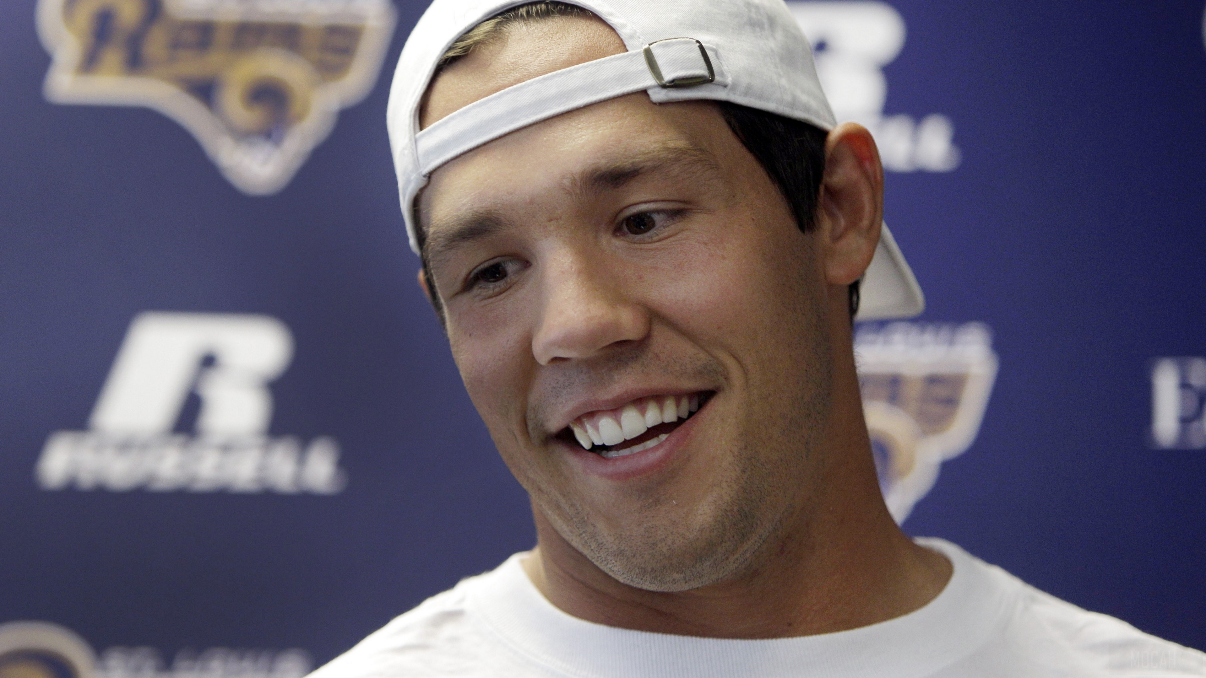 Sam Bradford wearing a Rams hat HD Wallpaper