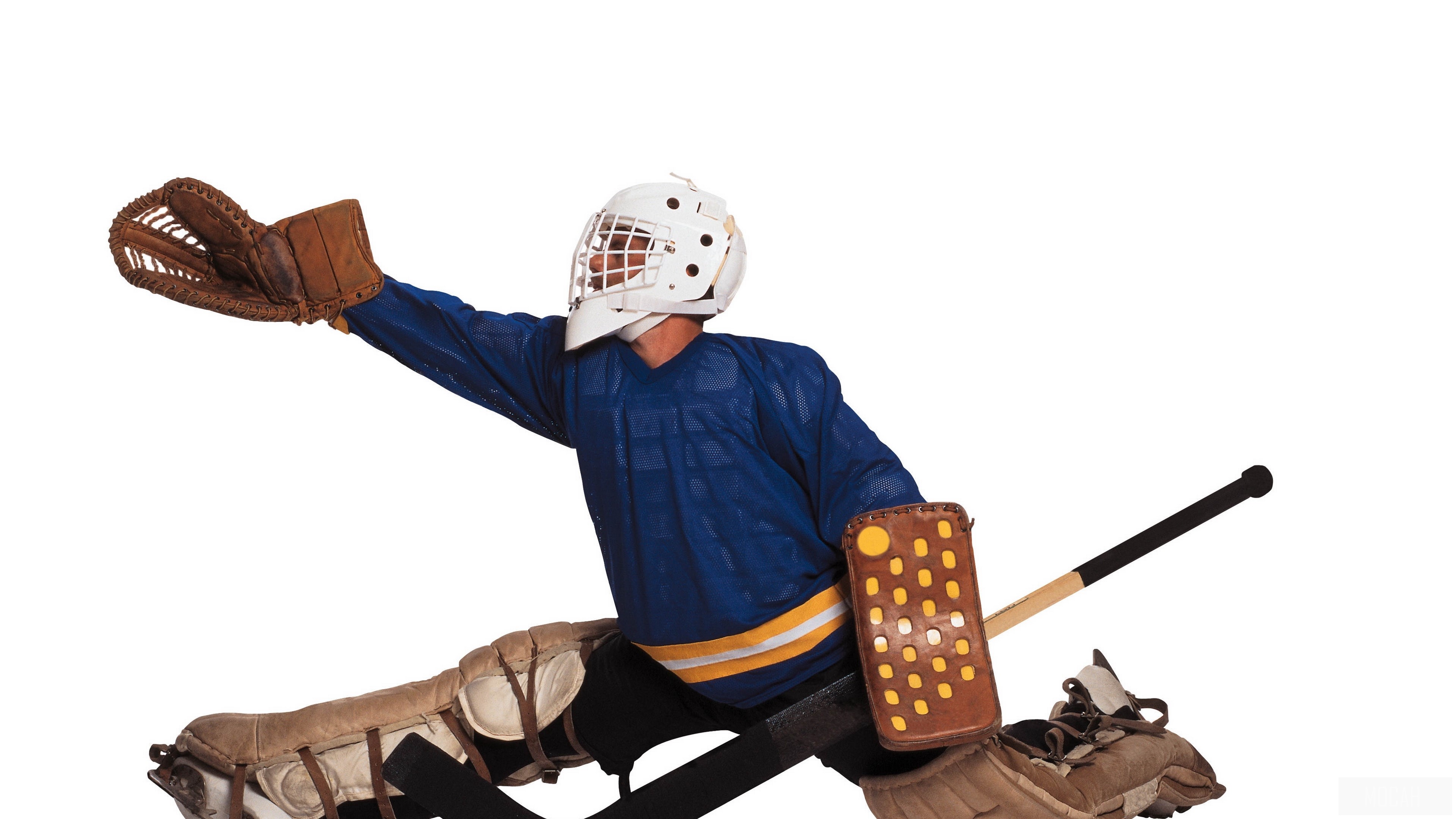 Hockey goalie in blue uniform with white mask and pads HD Wallpaper