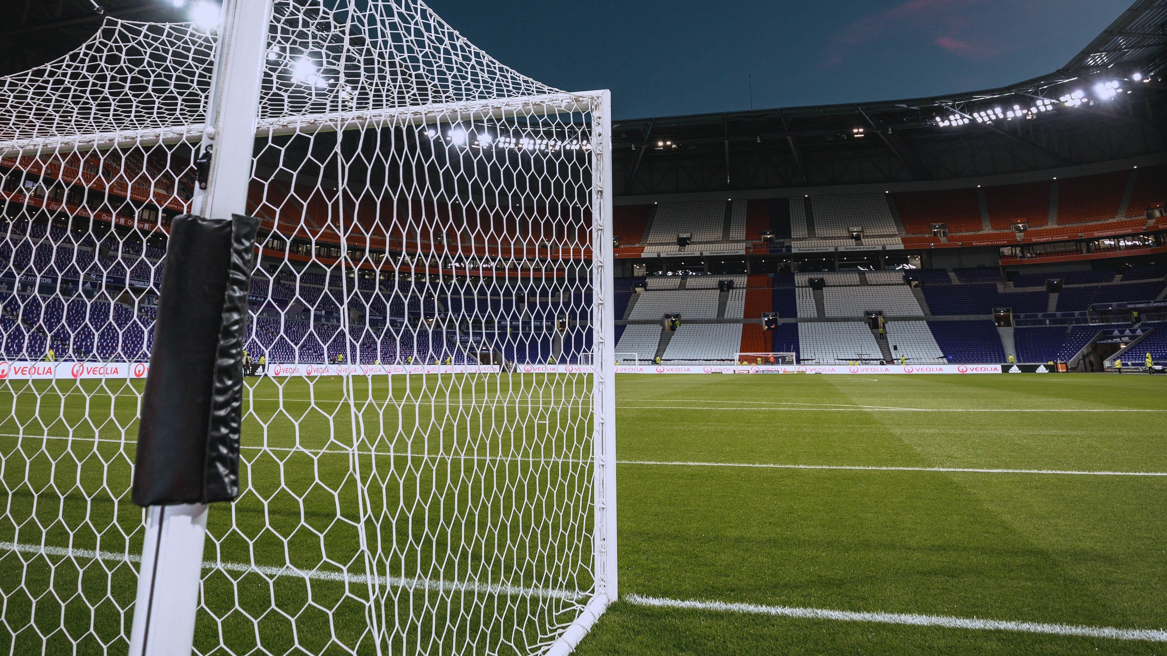 Football goal and stadium tribunes 4K HD Wallpaper