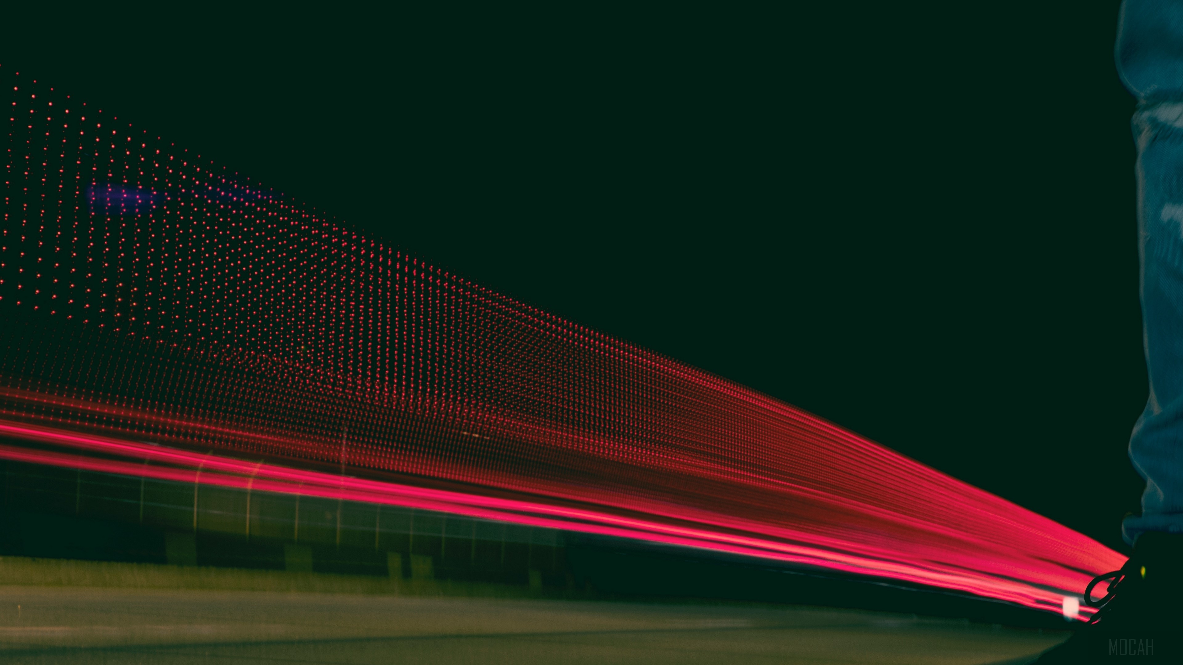 Red light trails and dots on dark background HD Wallpaper