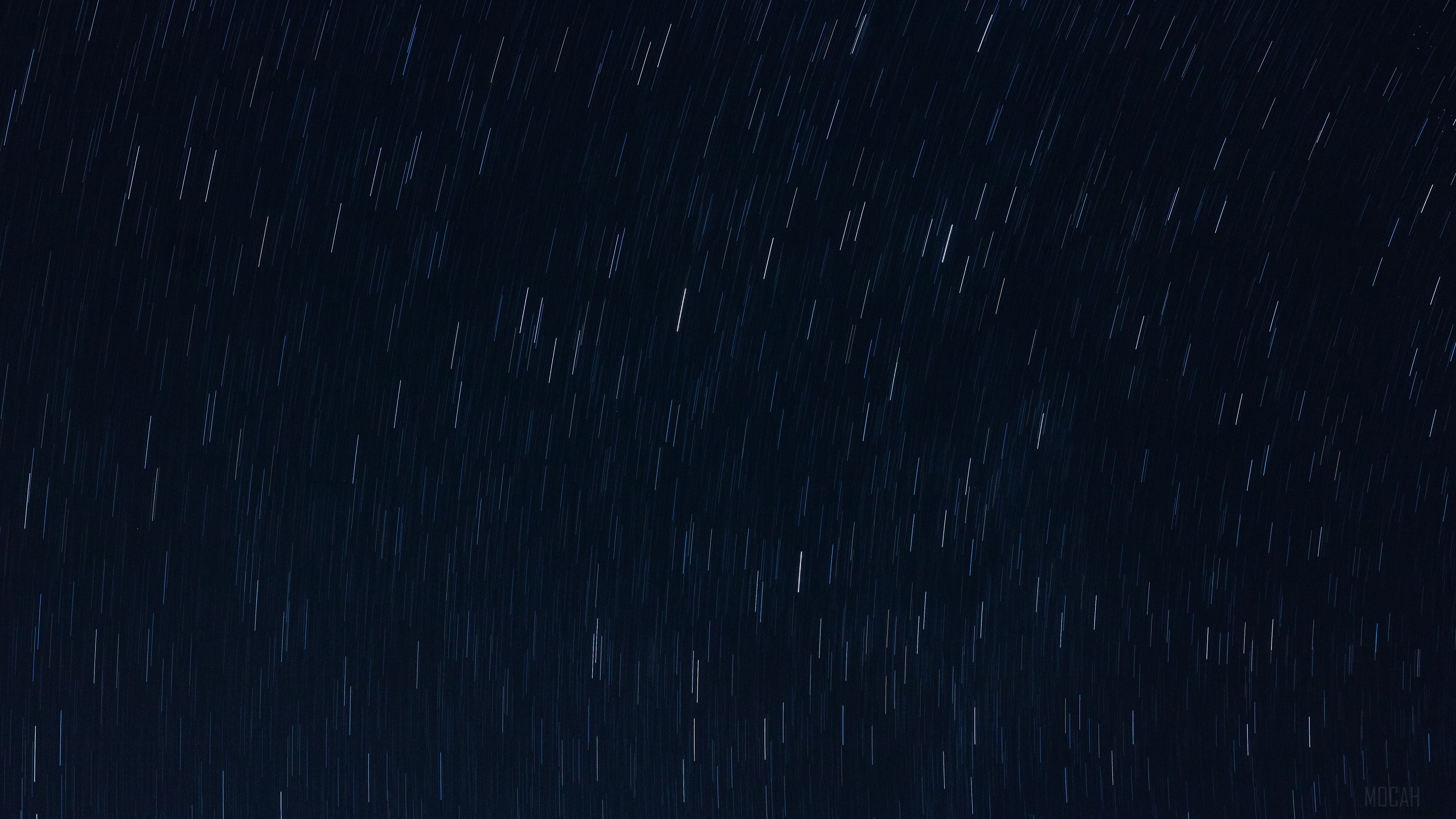 Star trails on a dark night sky HD Wallpaper