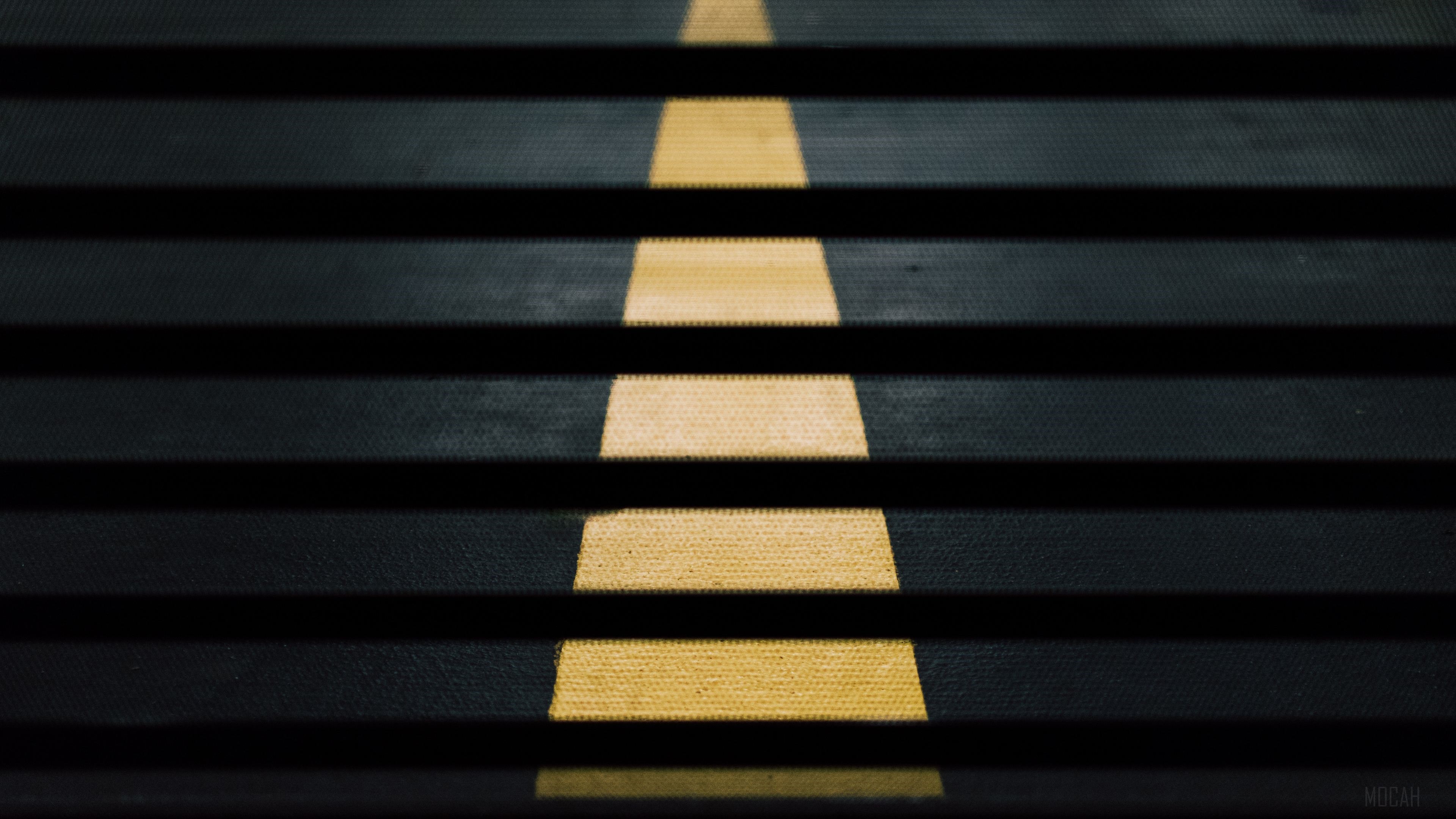 Yellow Line on Black Textured Surface HD Wallpaper