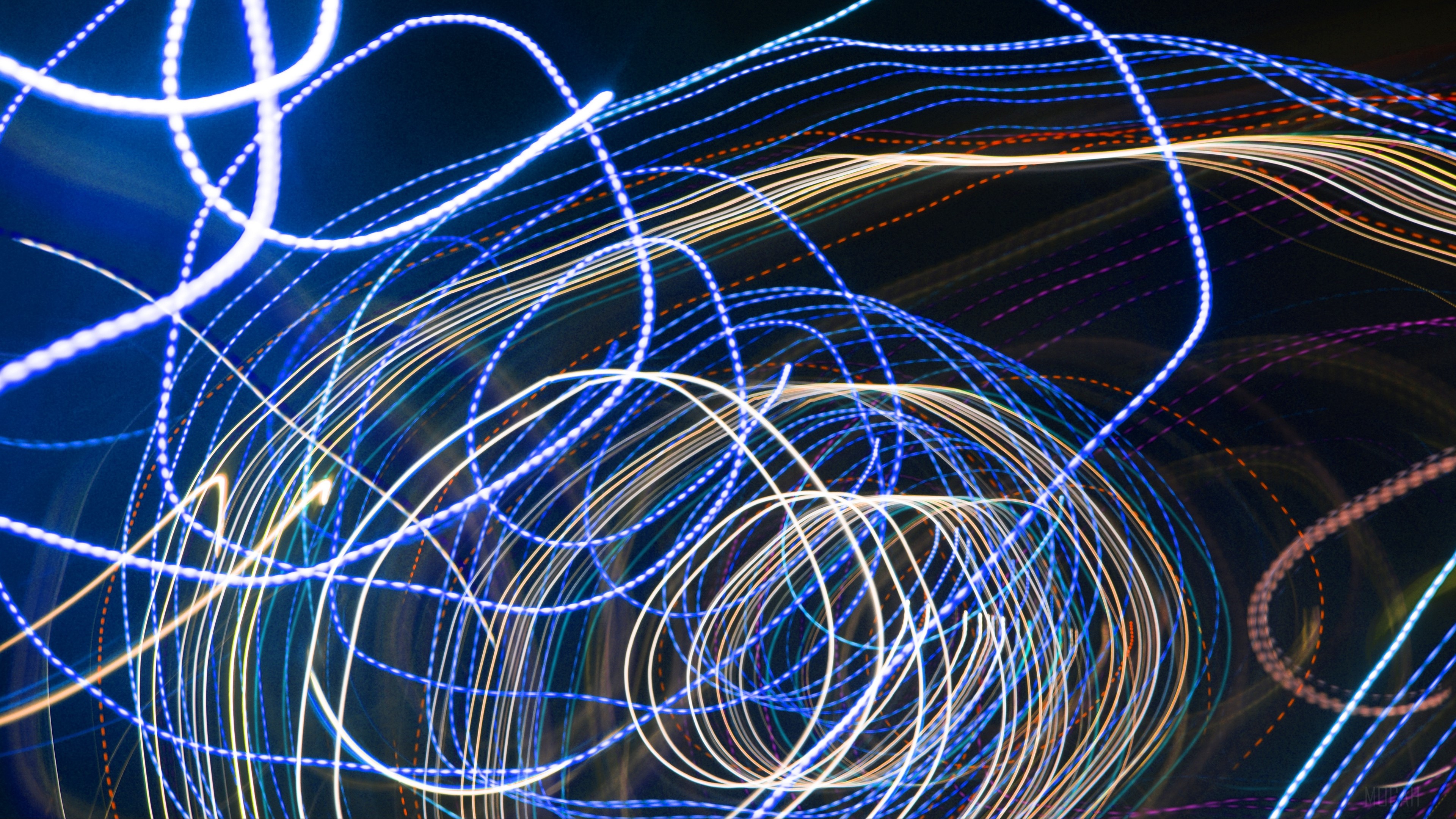 Abstract light trails in blue and yellow HD Wallpaper