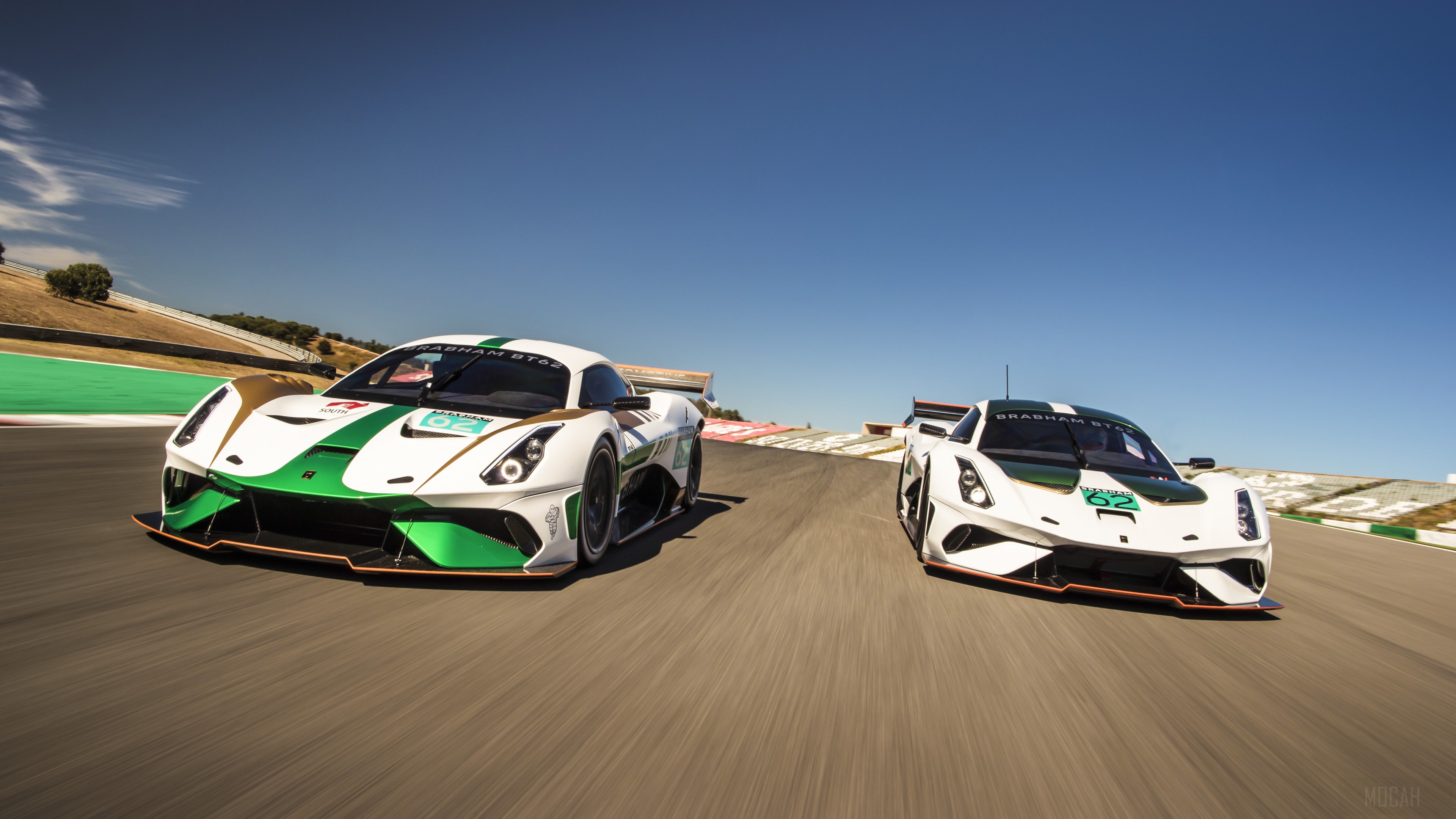 Two Brabham BT62 race cars on a track HD Wallpaper