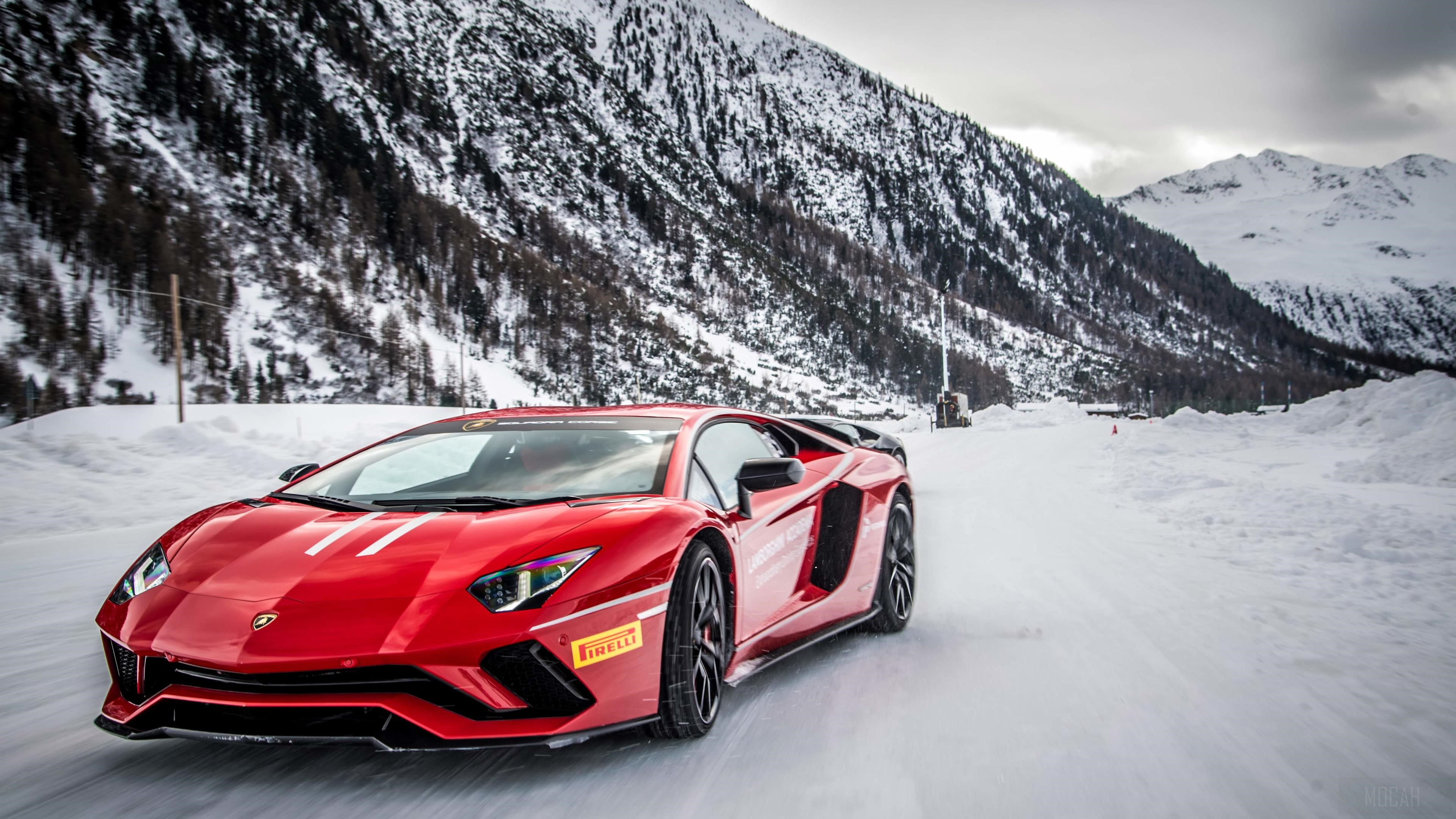 Red Lamborghini Aventador on a Snowy Road 4K HD Wallpaper