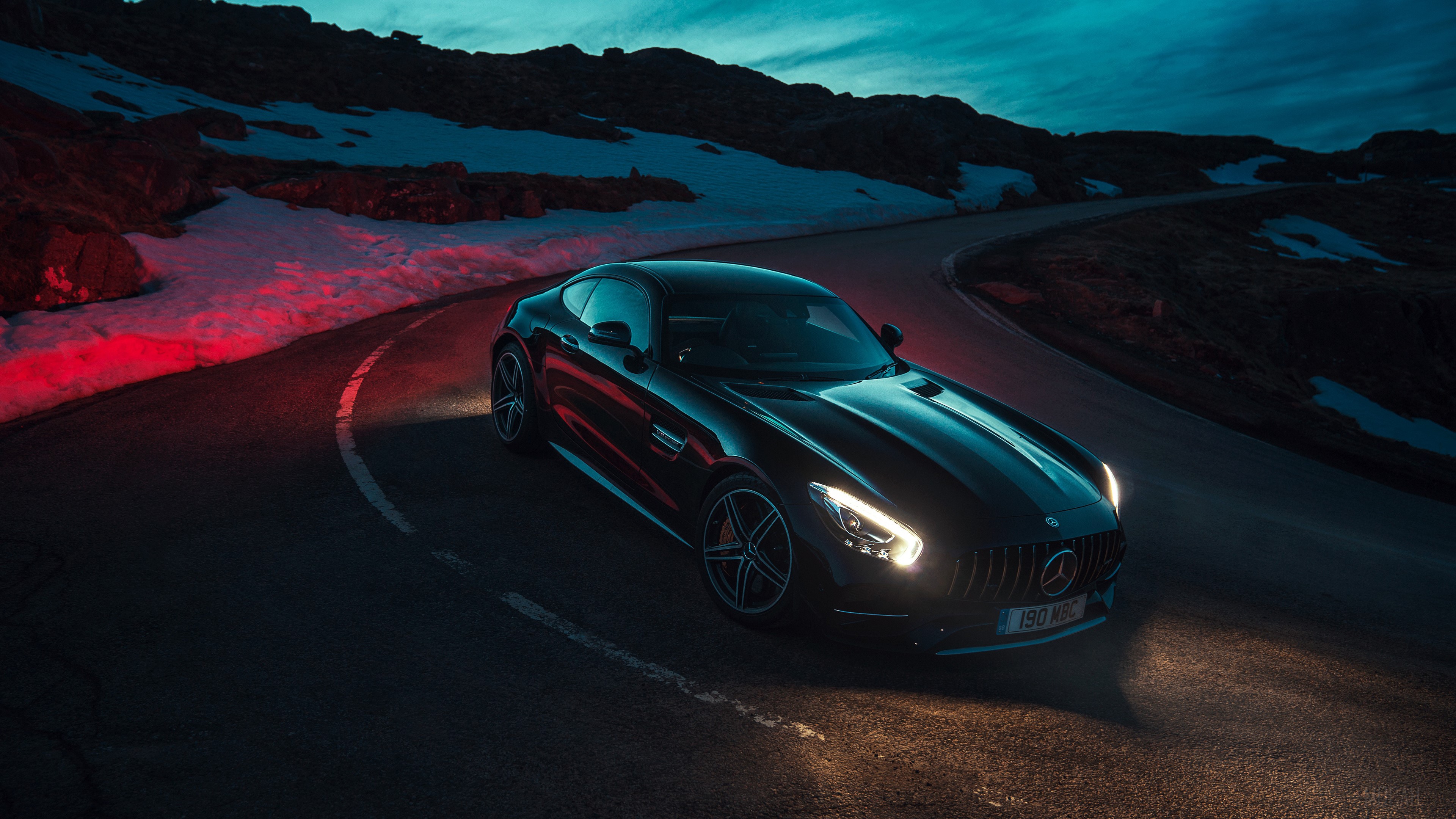 Black Mercedes-AMG GT C on a mountain road HD Wallpaper