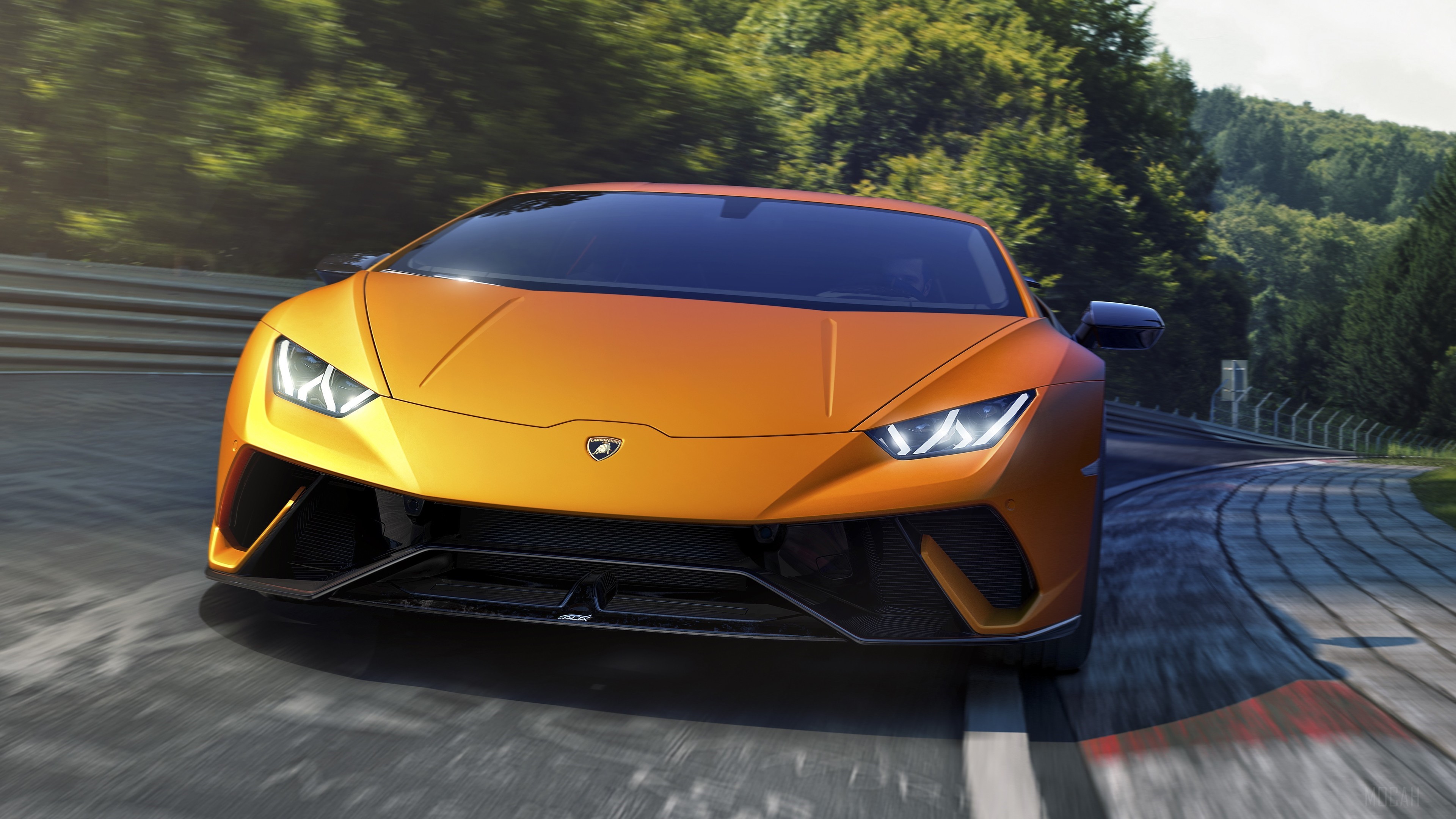 Orange Lamborghini Huracan Performante on a Racetrack 4K HD Wallpaper