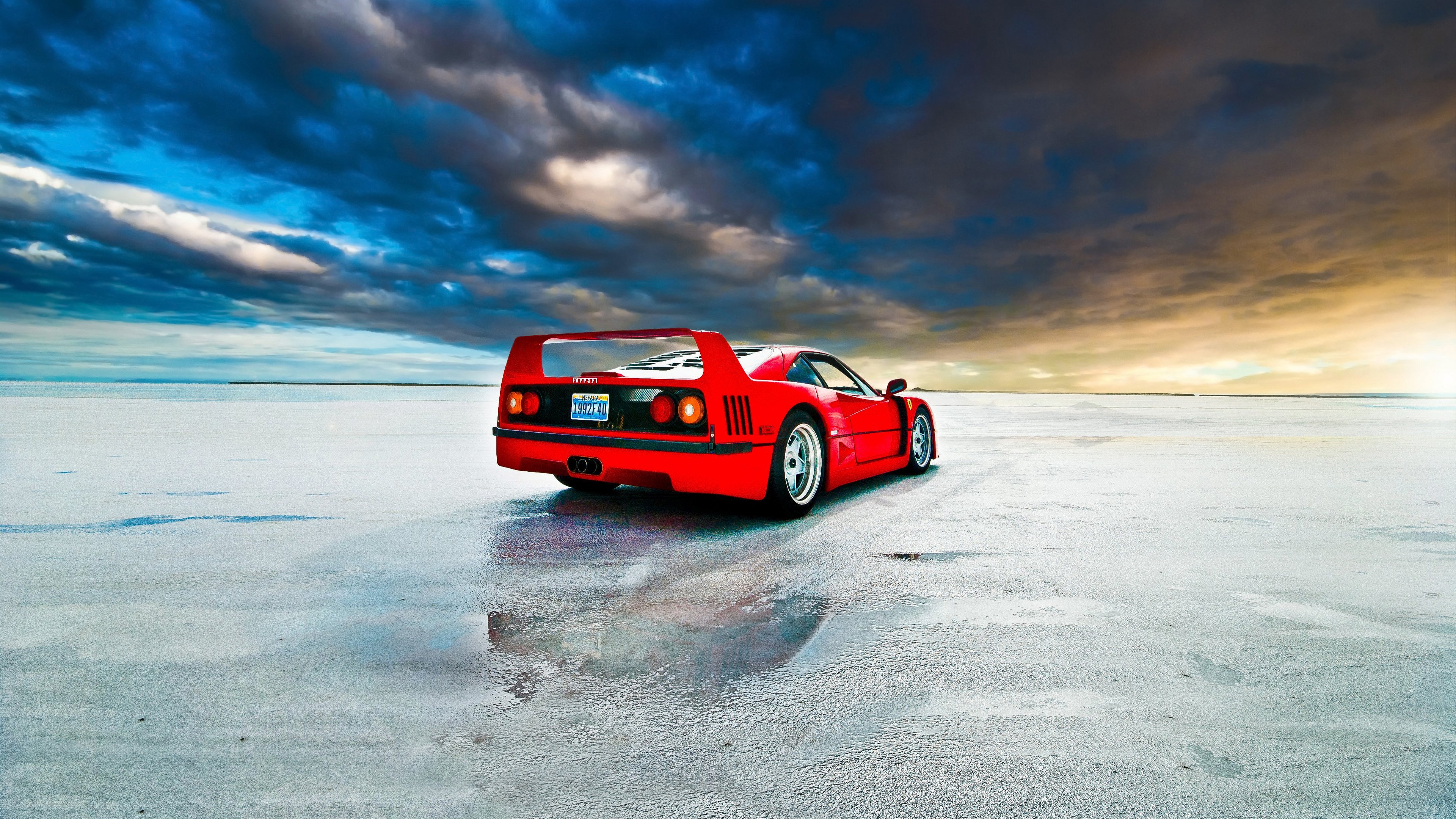 Red Ferrari F40 on wet salt flats HD Wallpaper