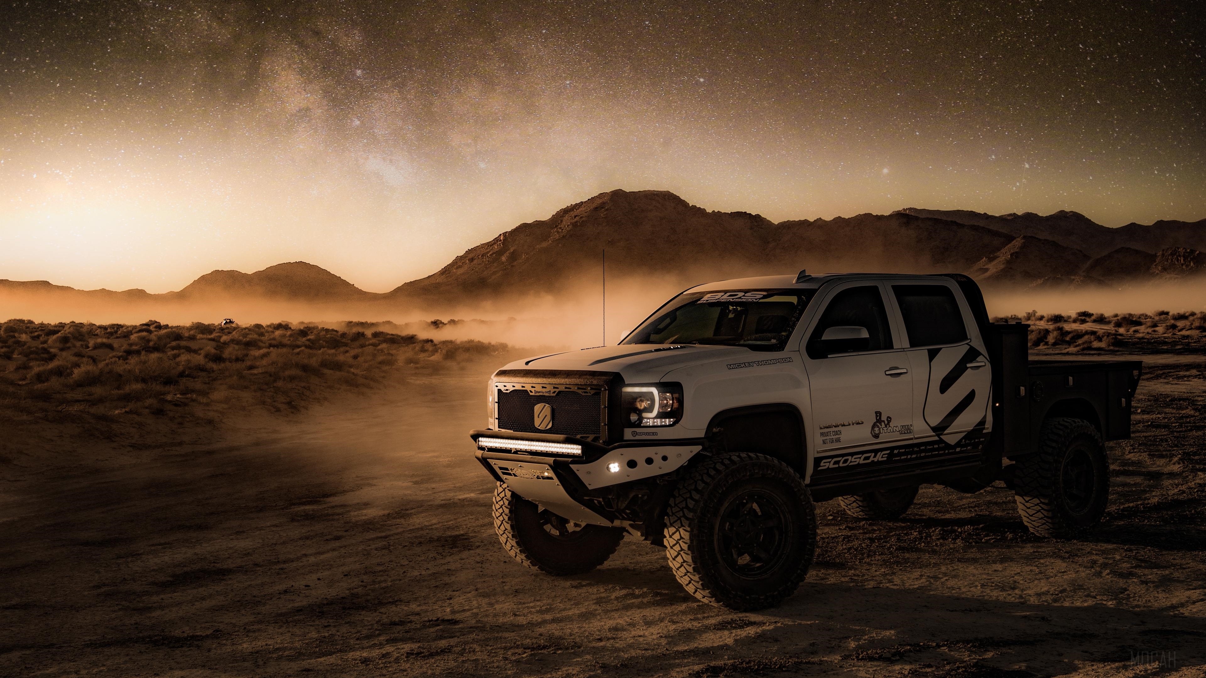 Offroad Truck in Desert Under Starry Sky 4K HD Wallpaper