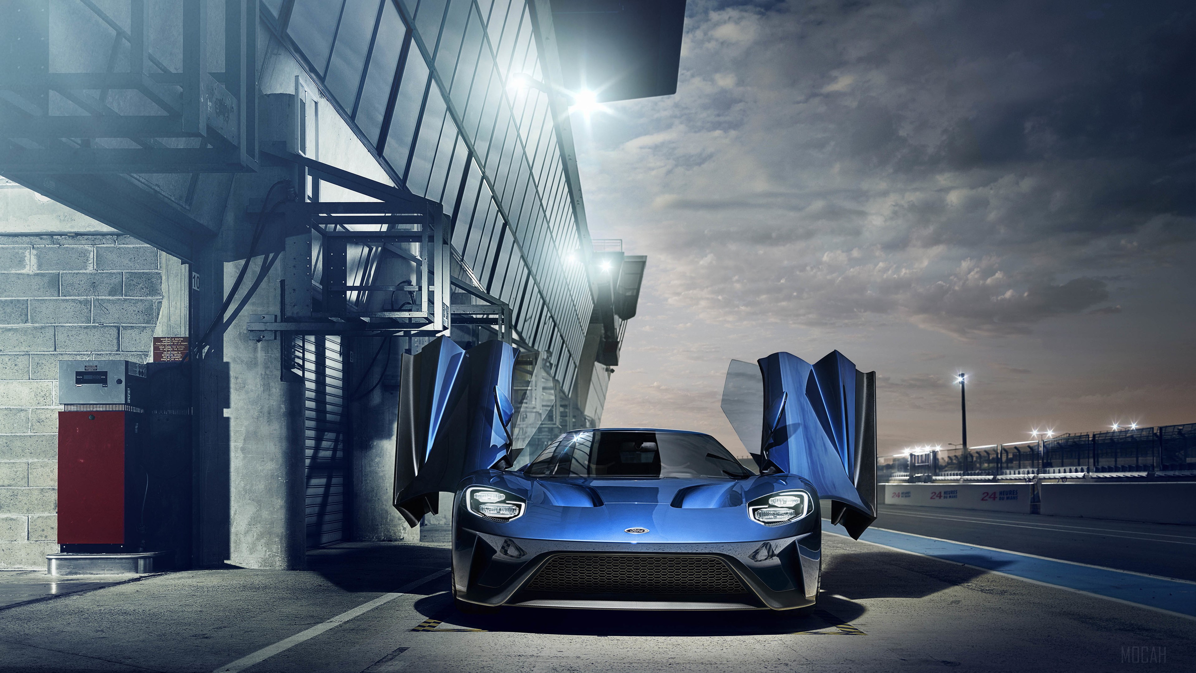 Blue Ford GT with Doors Open at Racetrack HD Wallpaper