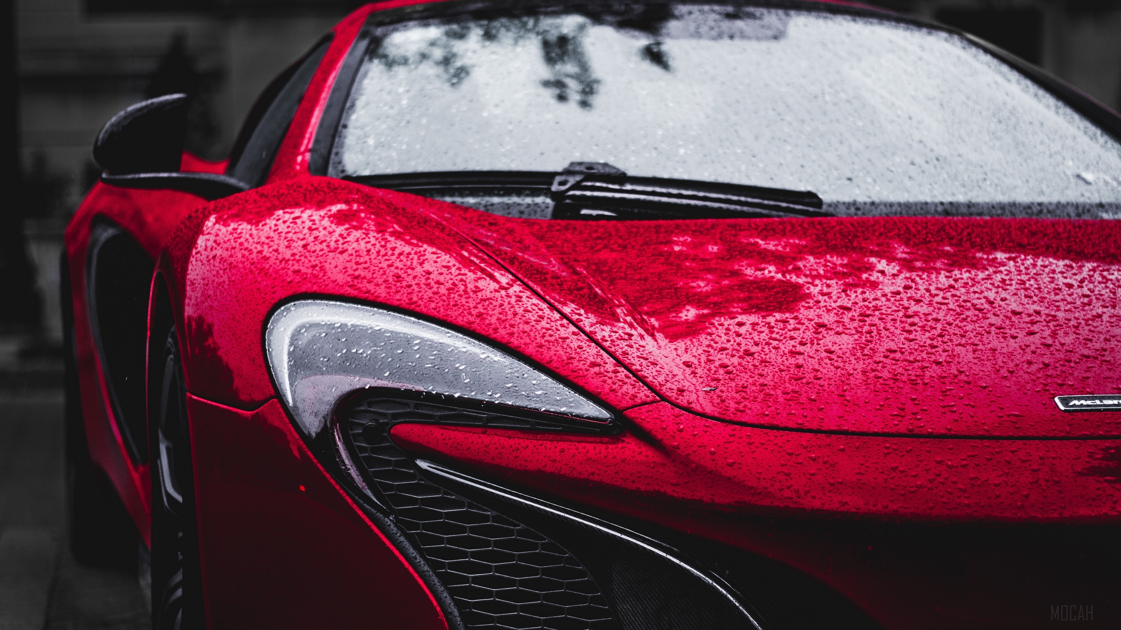 Red McLaren Supercar in Rain 4K HD Wallpaper