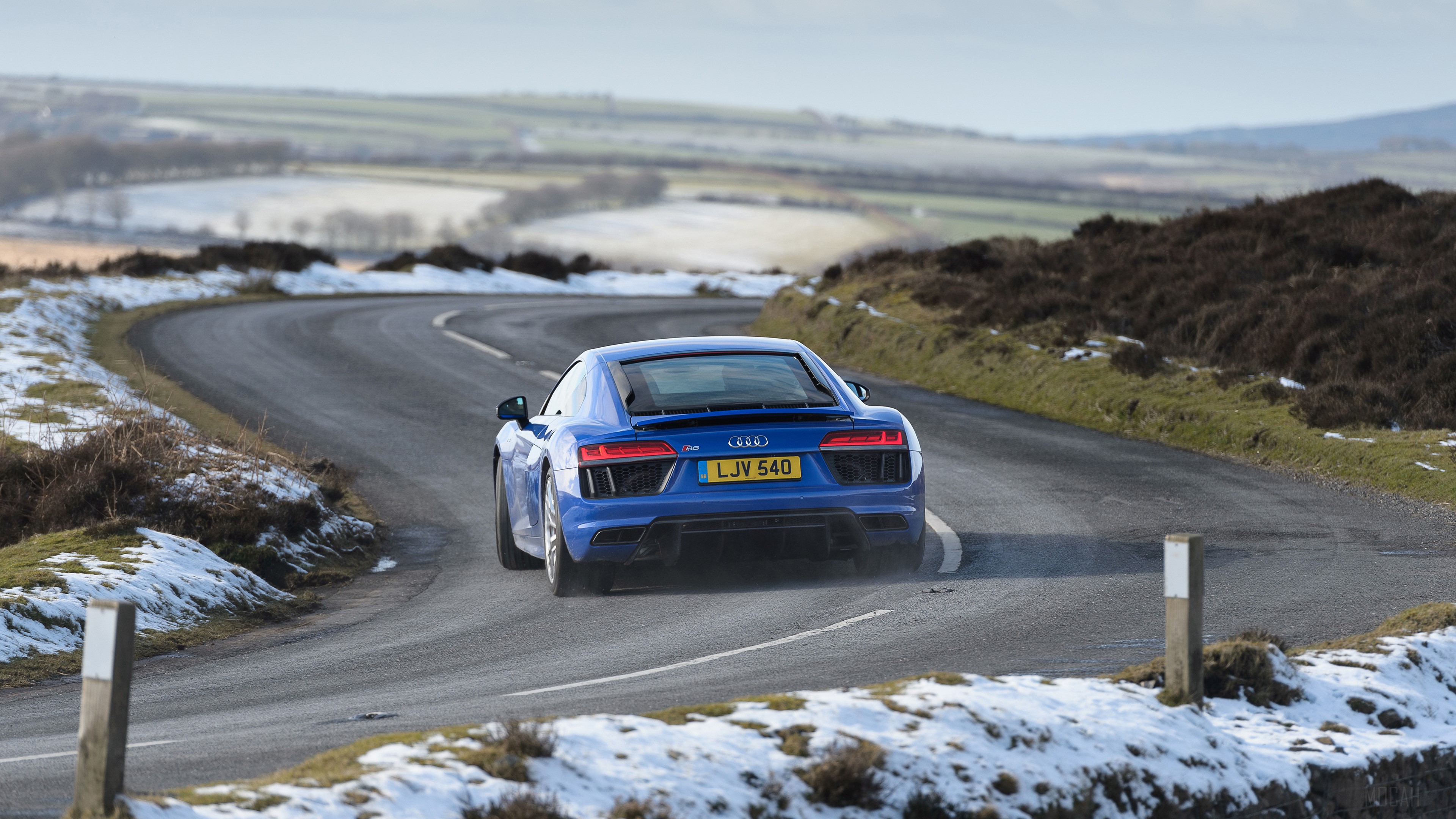 Blue Audi R8 V10 on a Winding Road 4K HD Wallpaper
