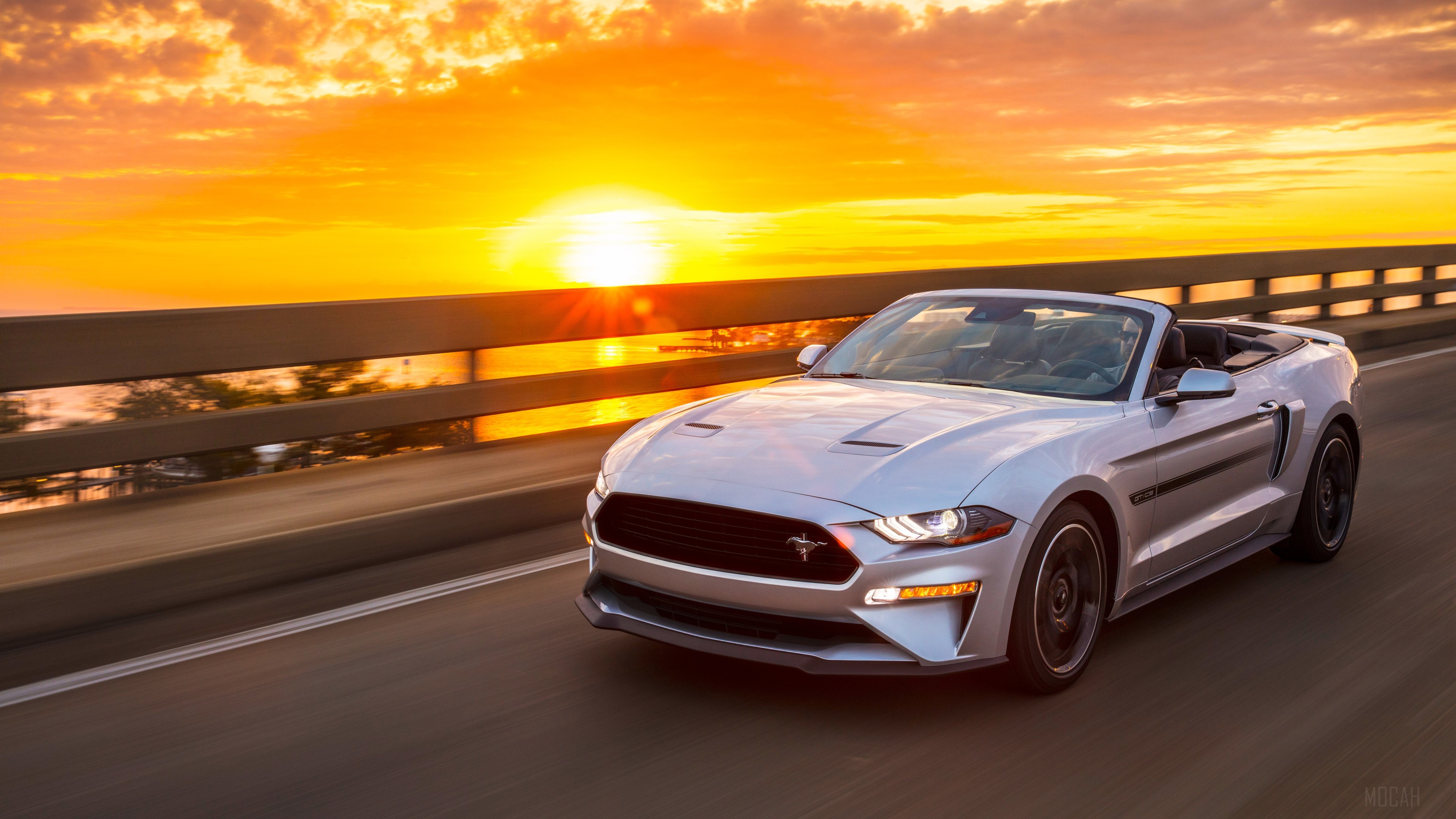 2019 Ford Mustang GT Convertible driving at sunset HD Wallpaper