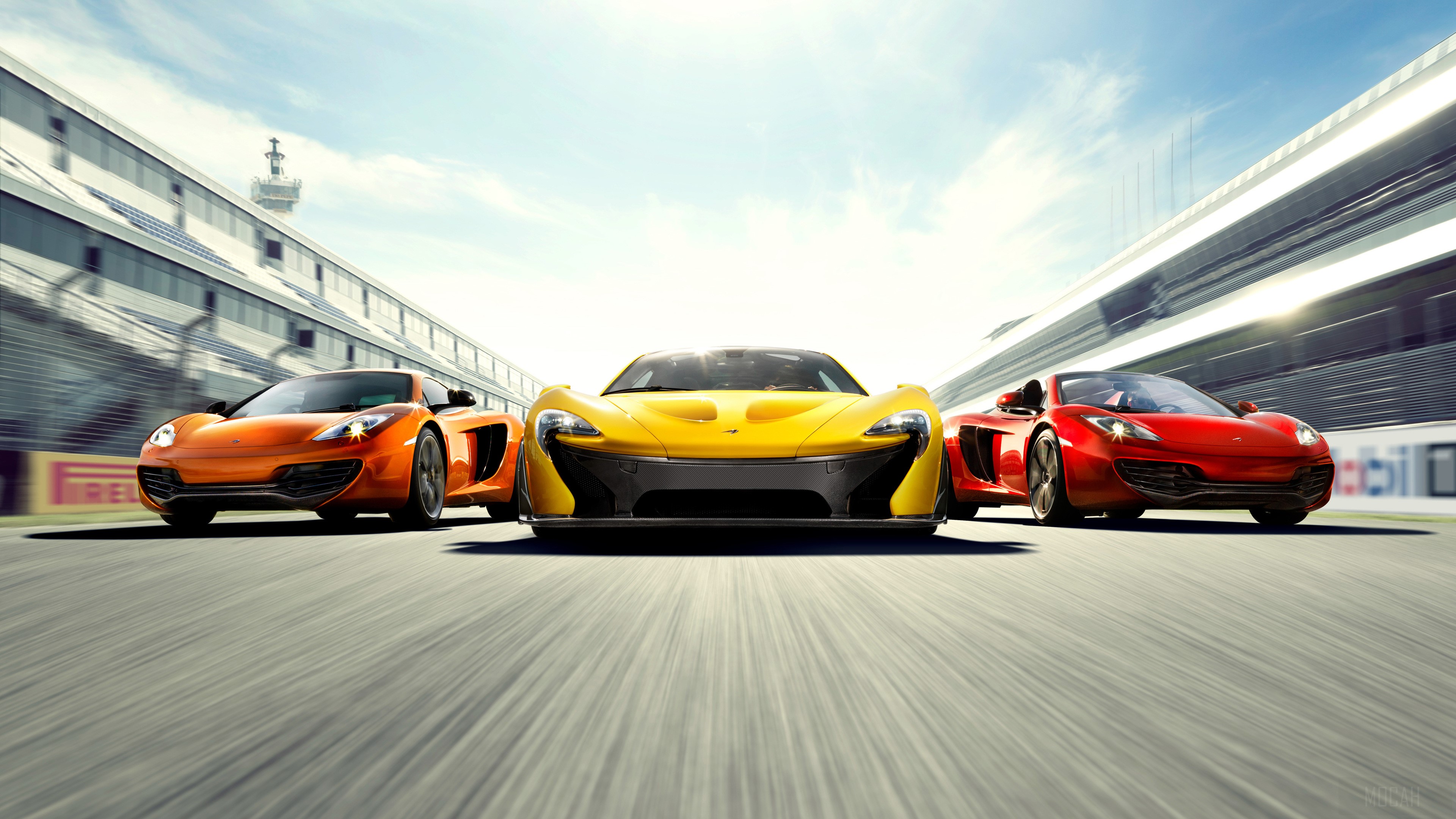 McLaren Sports Cars on Race Track 4K HD Wallpaper