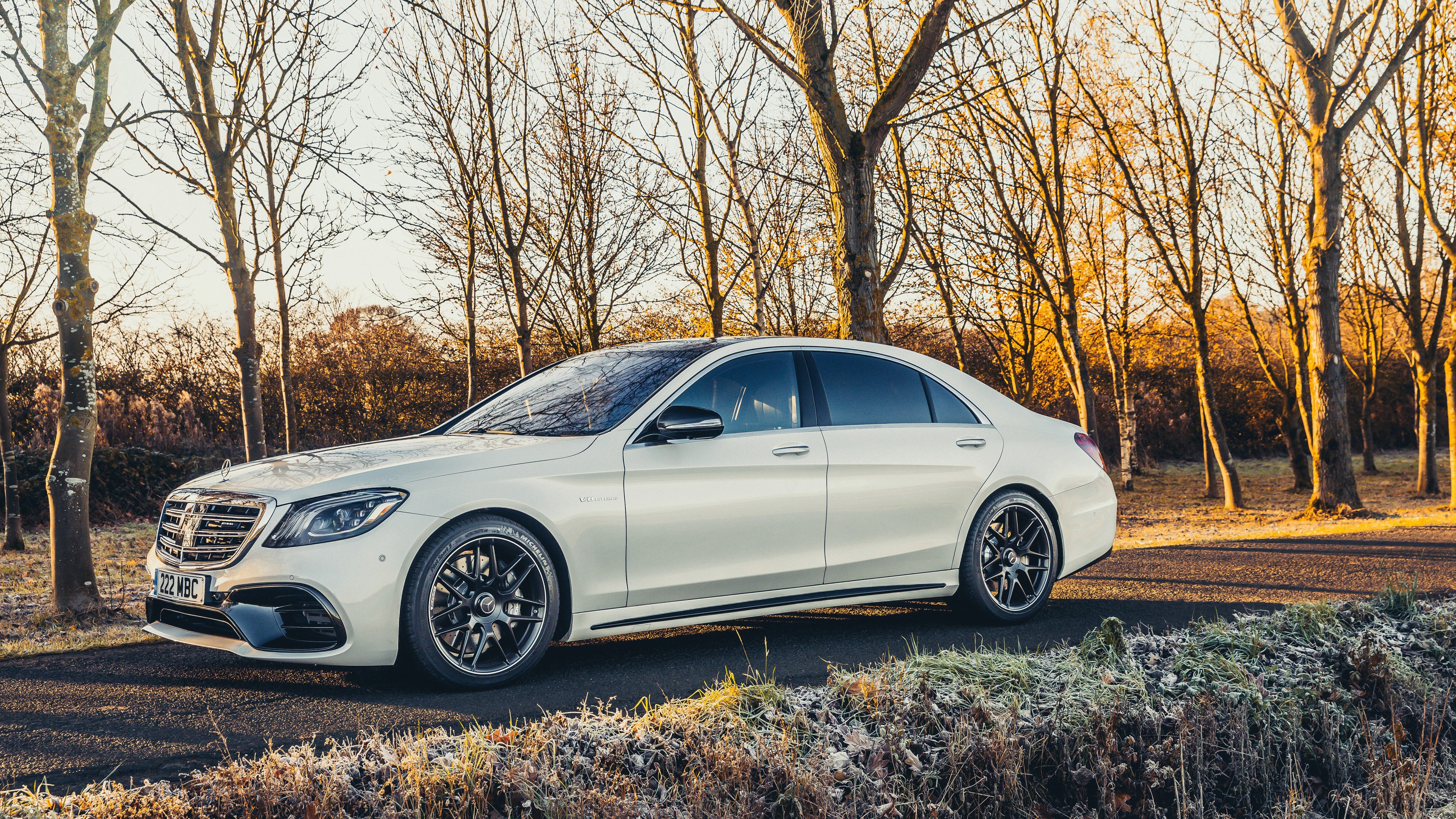 White Mercedes AMG S63 Sedan on a Road HD Wallpaper