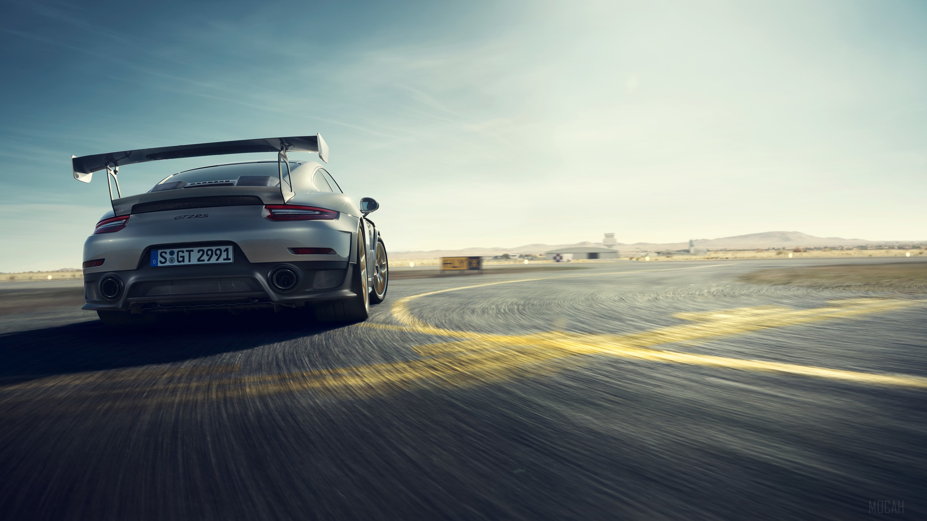 Porsche 911 GT2 RS on a race track HD Wallpaper