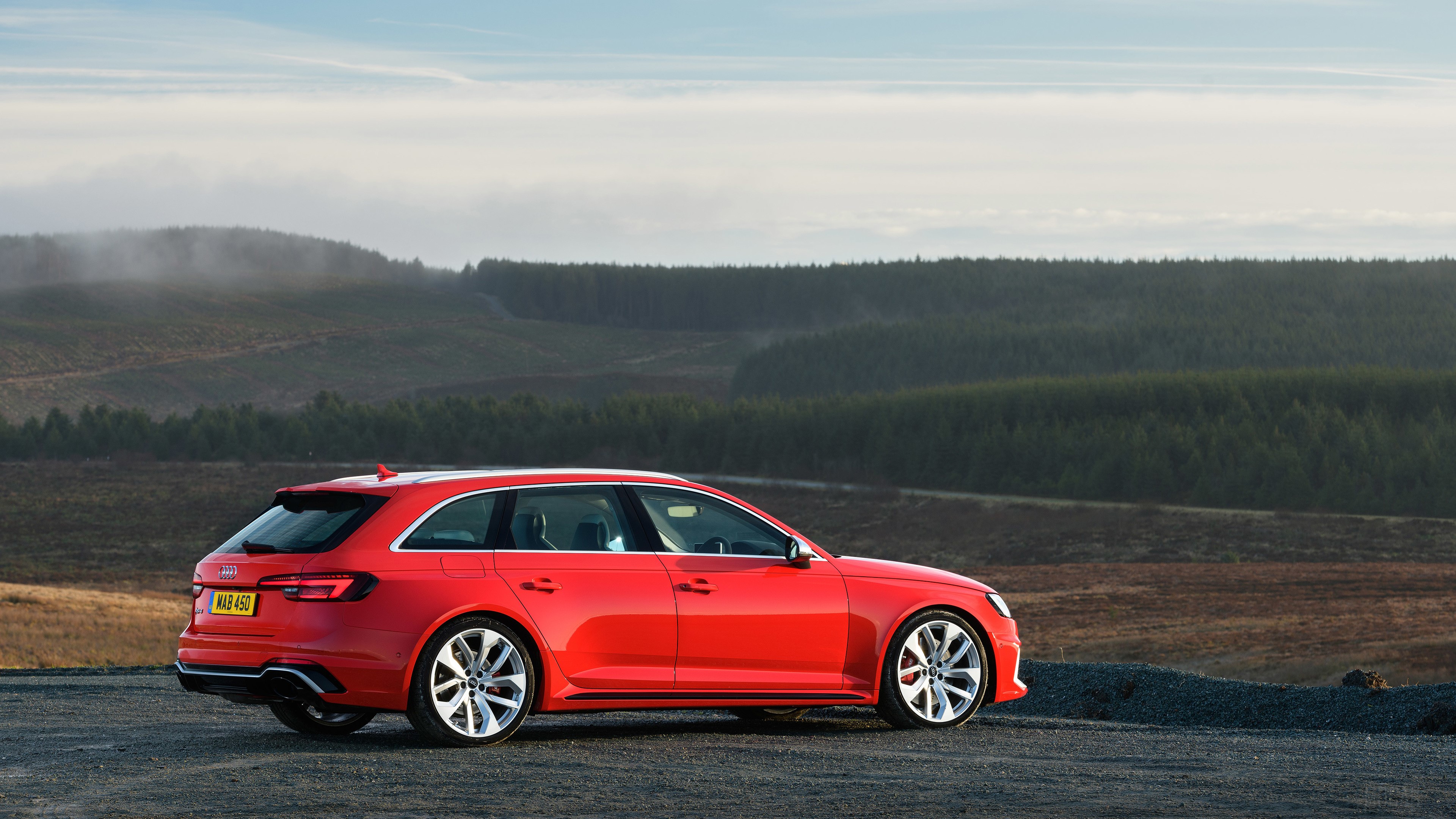 Red Audi RS 4 Avant parked on a hill HD Wallpaper