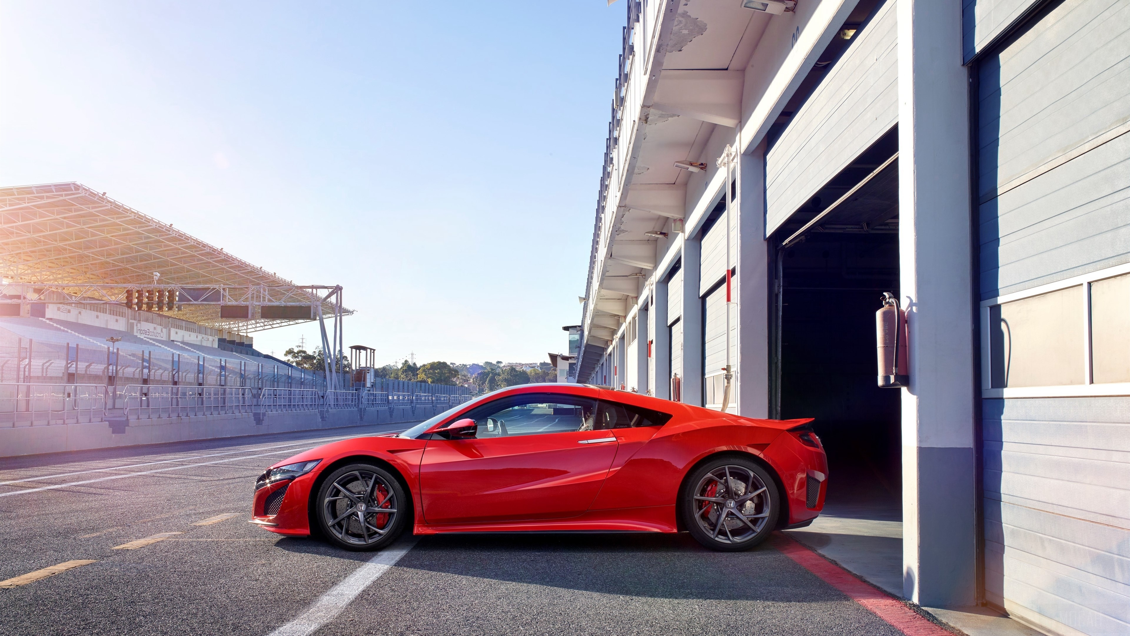 Red Acura NSX on a race track HD Wallpaper