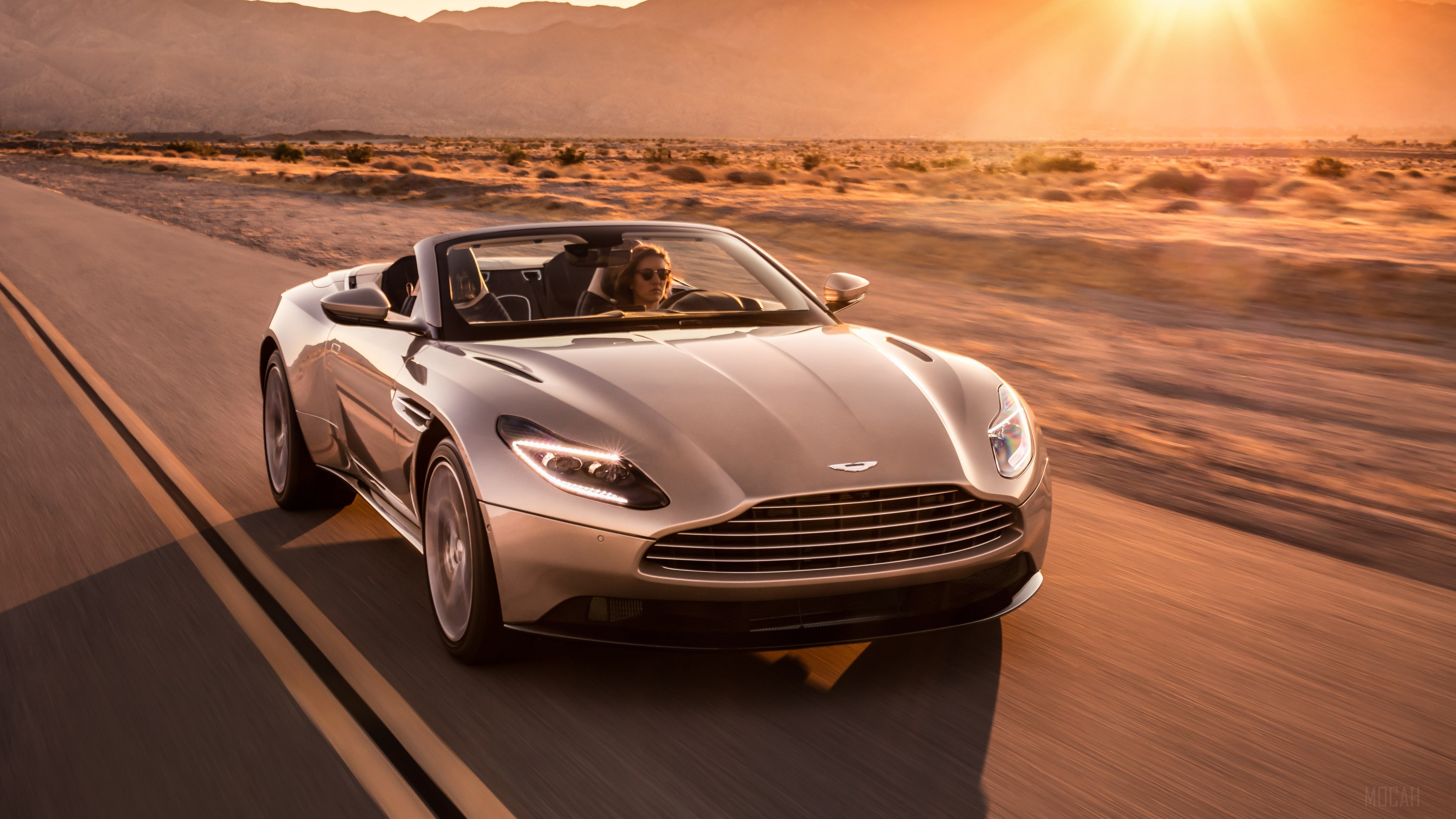 2018 Aston Martin DB11 Volante driving on road HD Wallpaper